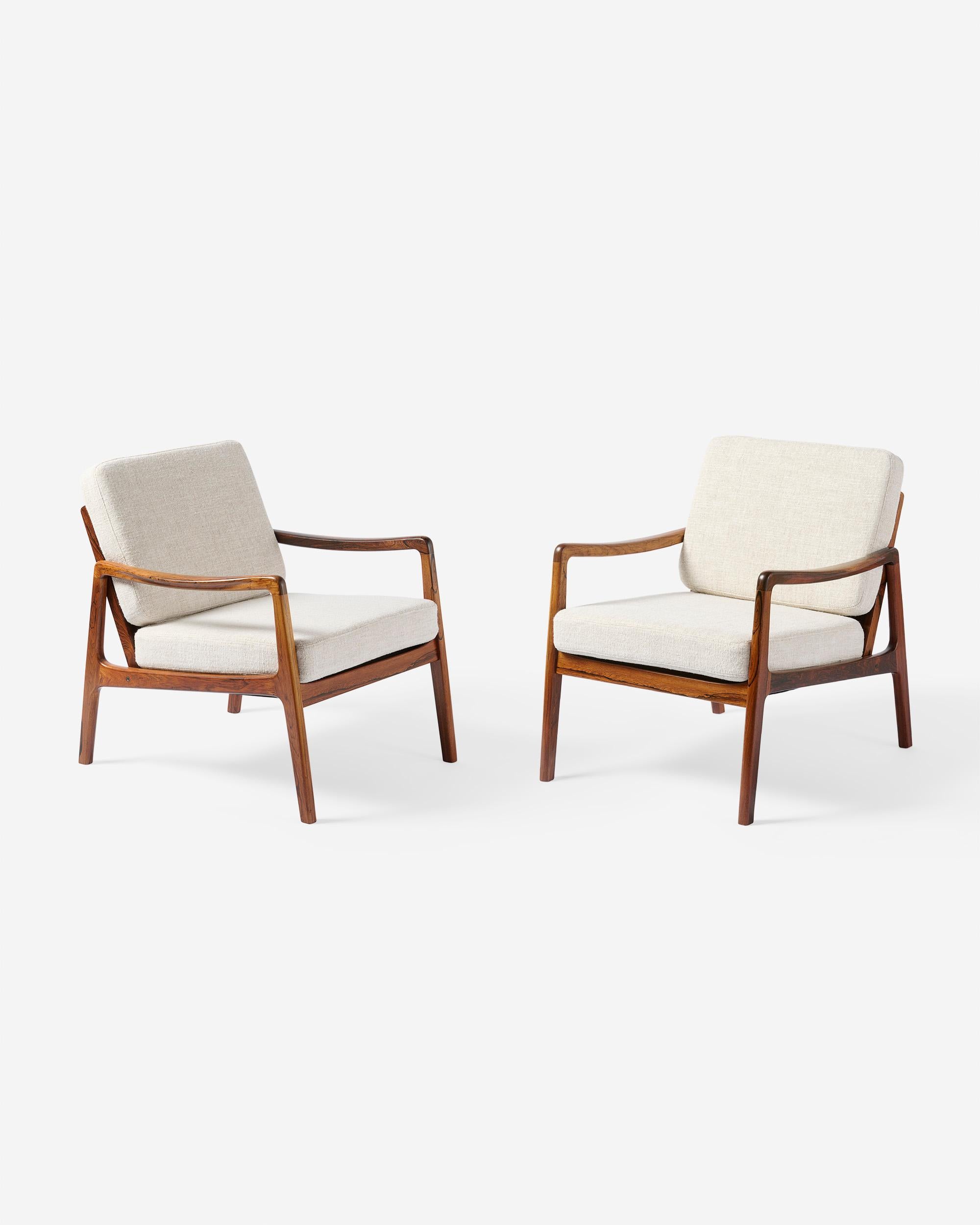 Ole Wanscher - Model FD-119 Lounge Chairs, c1960

An extremely rare and collectible pair of Wanscher's much-loved, elegant lounge chair for France & Daverkosen. The FD-119 was produced in highly figured rosewood in a limited and numbered edition in
