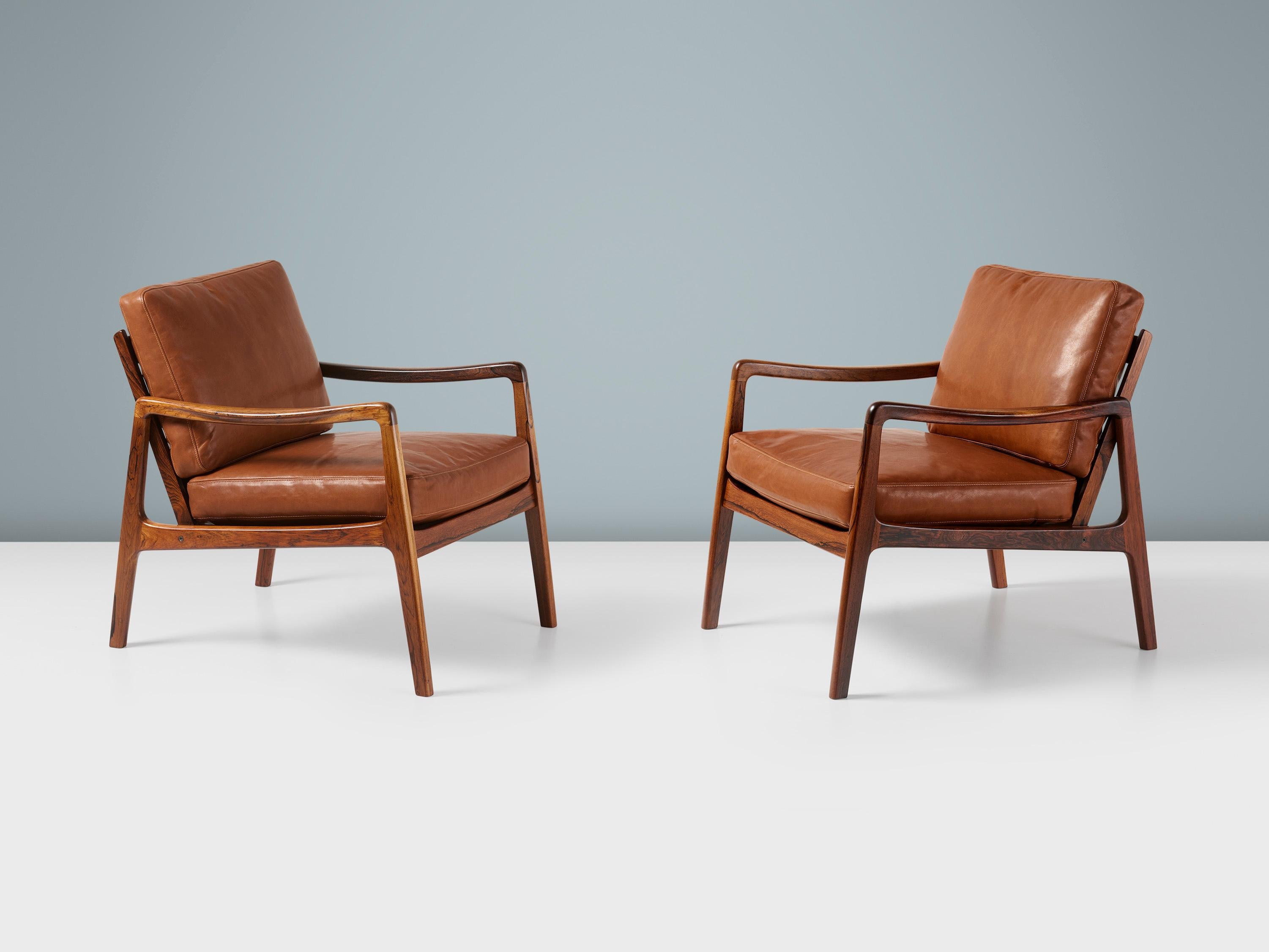 Ole Wanscher - Model FD-119 Lounge Chairs, c1960

An extremely rare and collectible pair of Wanscher's much-loved, elegant lounge chair for France & Daverkosen. The FD-119 was produced in highly figured rosewood in a limited and numbered edition in