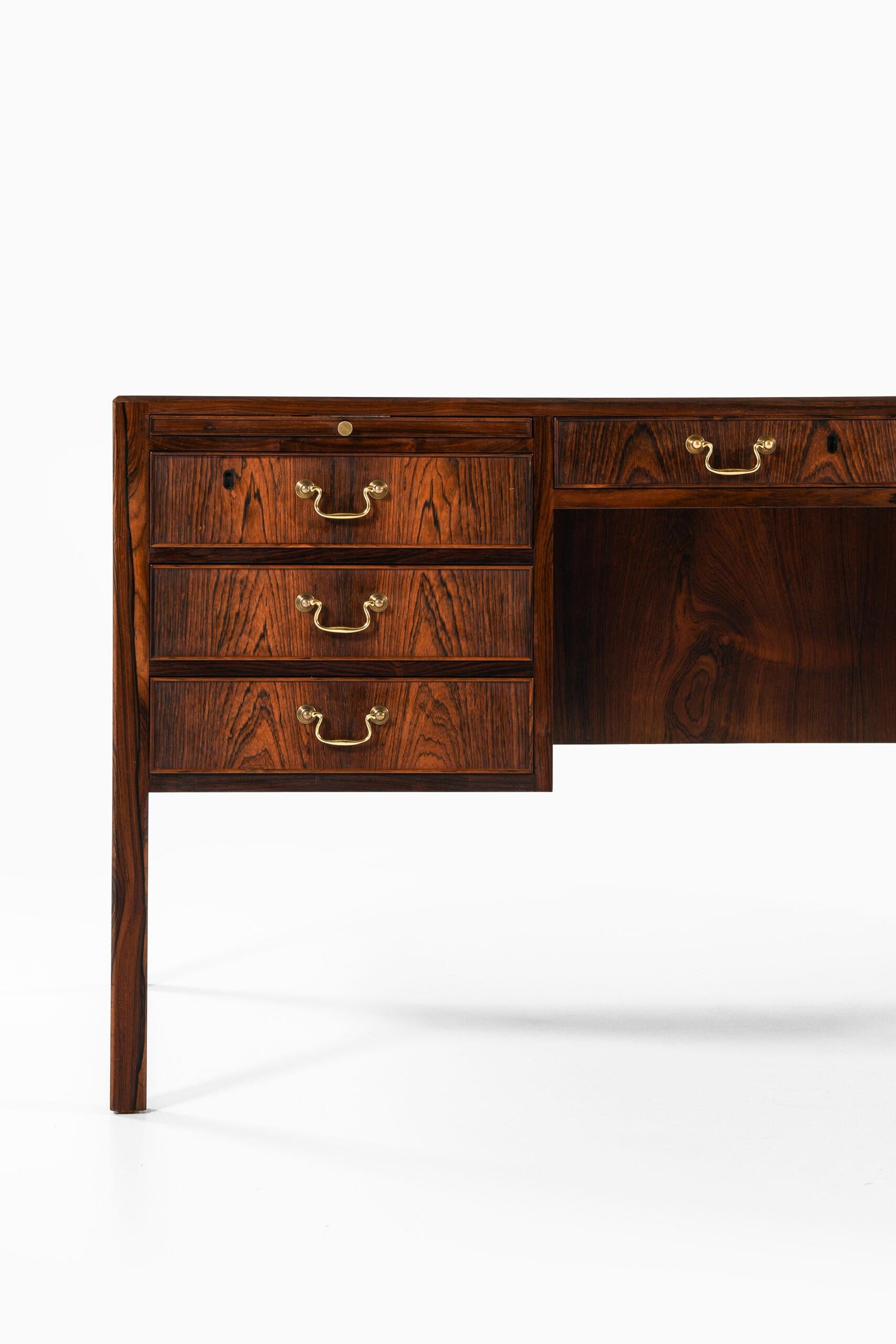 Rare freestanding desk designed by Ole Wanscher. Produced by cabinetmaker A.J. Iversen in Denmark.
 