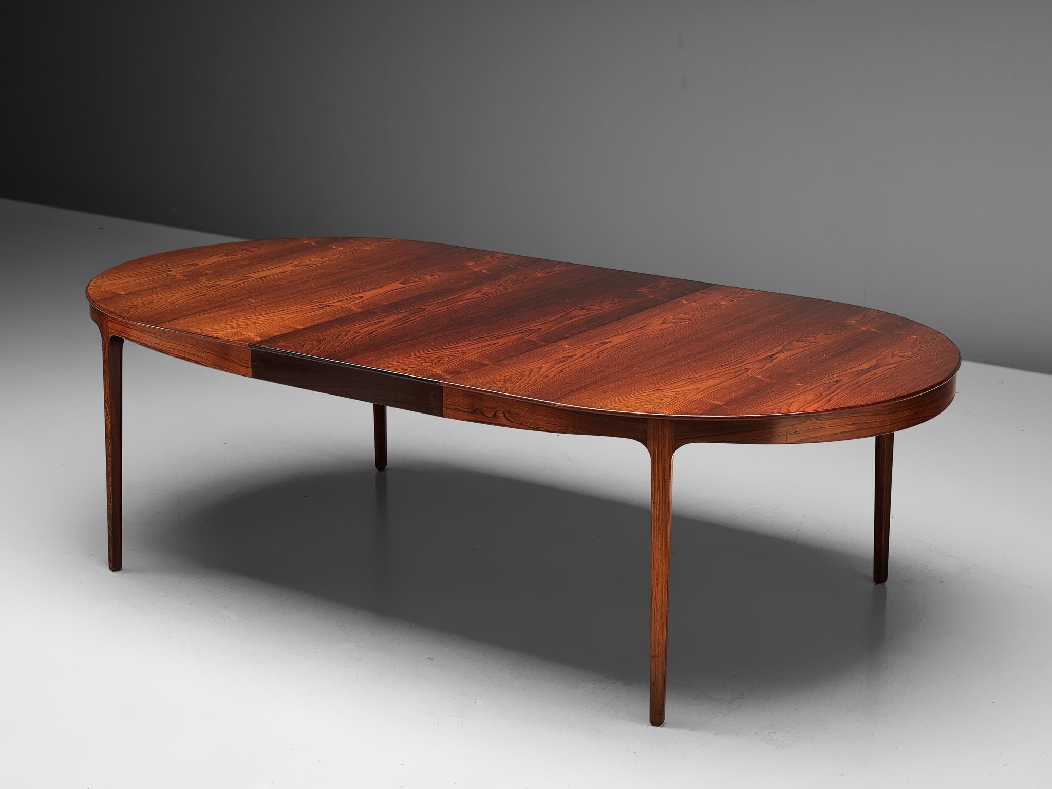 Ole Wanscher for AJ Iversen, dining table, rosewood, Denmark, 1963

A luxurious dining table in rosewood by Danish designer Ole Wanscher. The oval shaped dining table comes with two additional leaves, which makes this a highly versatile piece. The