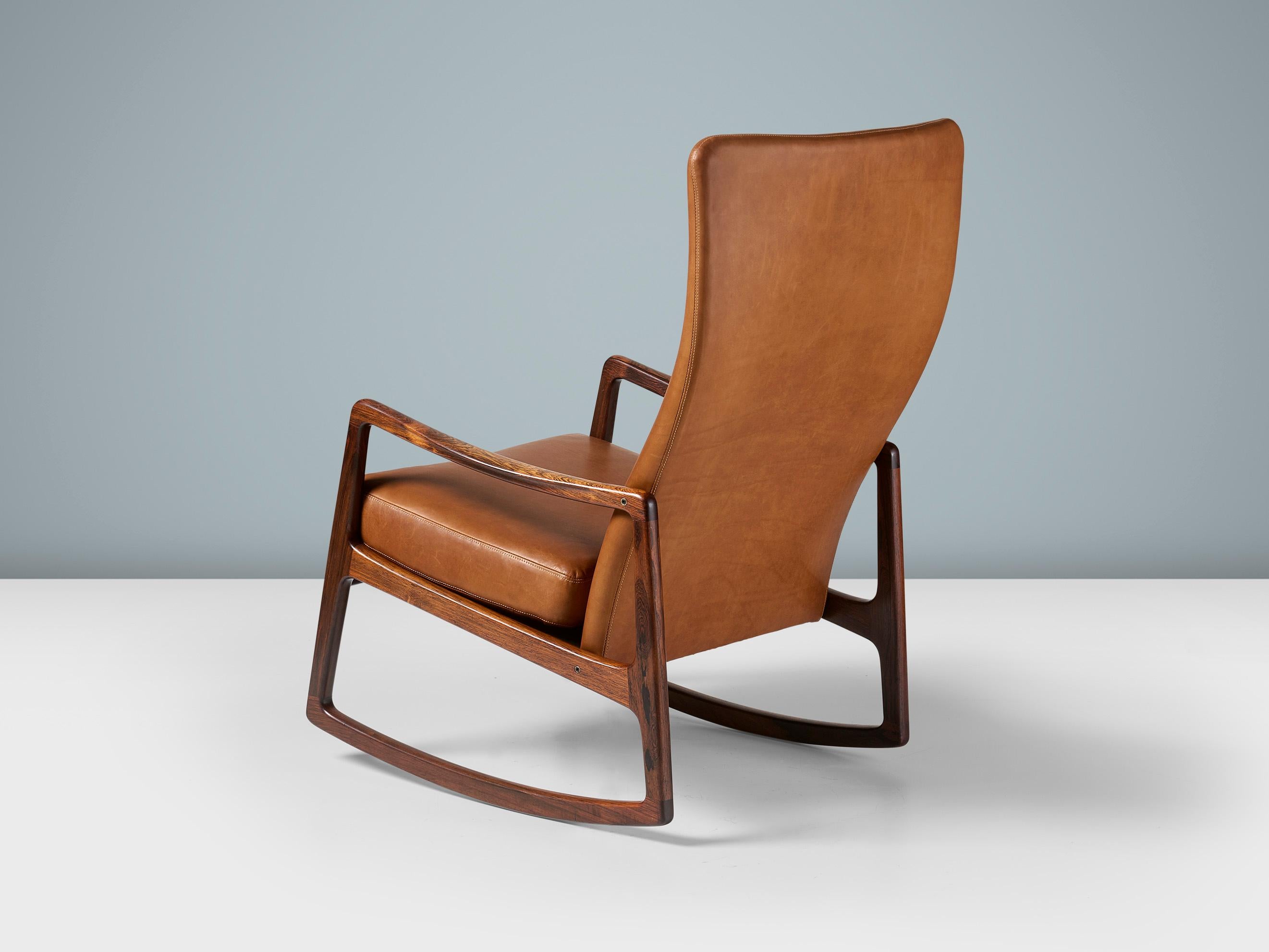 Ole Wanscher - Model FD-160 Rocking Chair

This rarely seen high-back rocking chair by master-designer Ole Wanscher was produced by France & Daverkosen in Denmark in the early 1960s. The immaculate rosewood frame is highly figured and the seat and