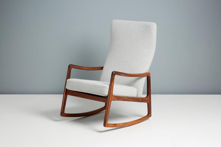 Ole Wanscher- Model FD-160 rocking chair

This rarely seen high-back rocking chair by master-designer Ole Wanscher was produced by France & Daverkosen in Denmark in the early 1960s. The immaculate rosewood frame is highly figured and the seat and