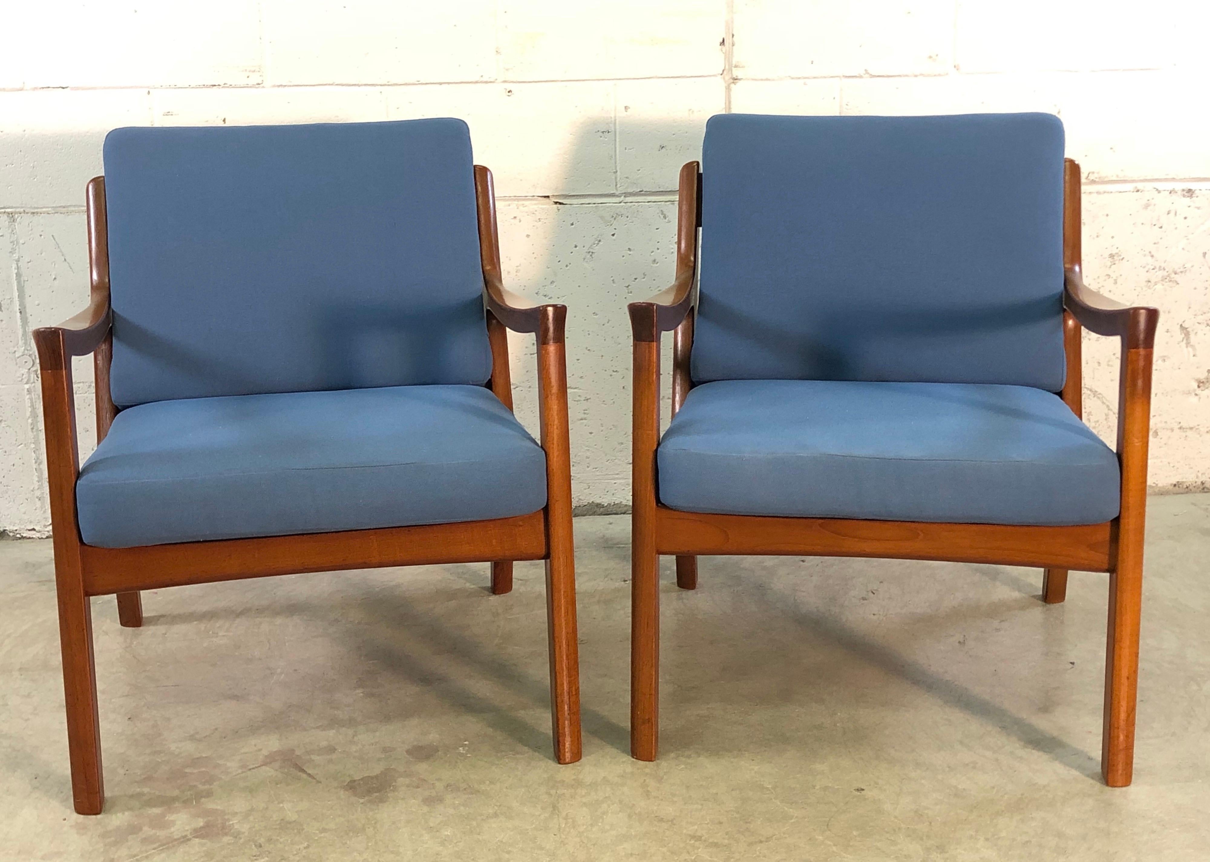Vintage Danish modern Ole Wanscher for France & Sons Denmark pair of Senator easy chairs in teak. The chairs are in excellent condition, very strong and sturdy. The chairs are comfortable and well designed. Cushion fabric needs replacement. Marked.