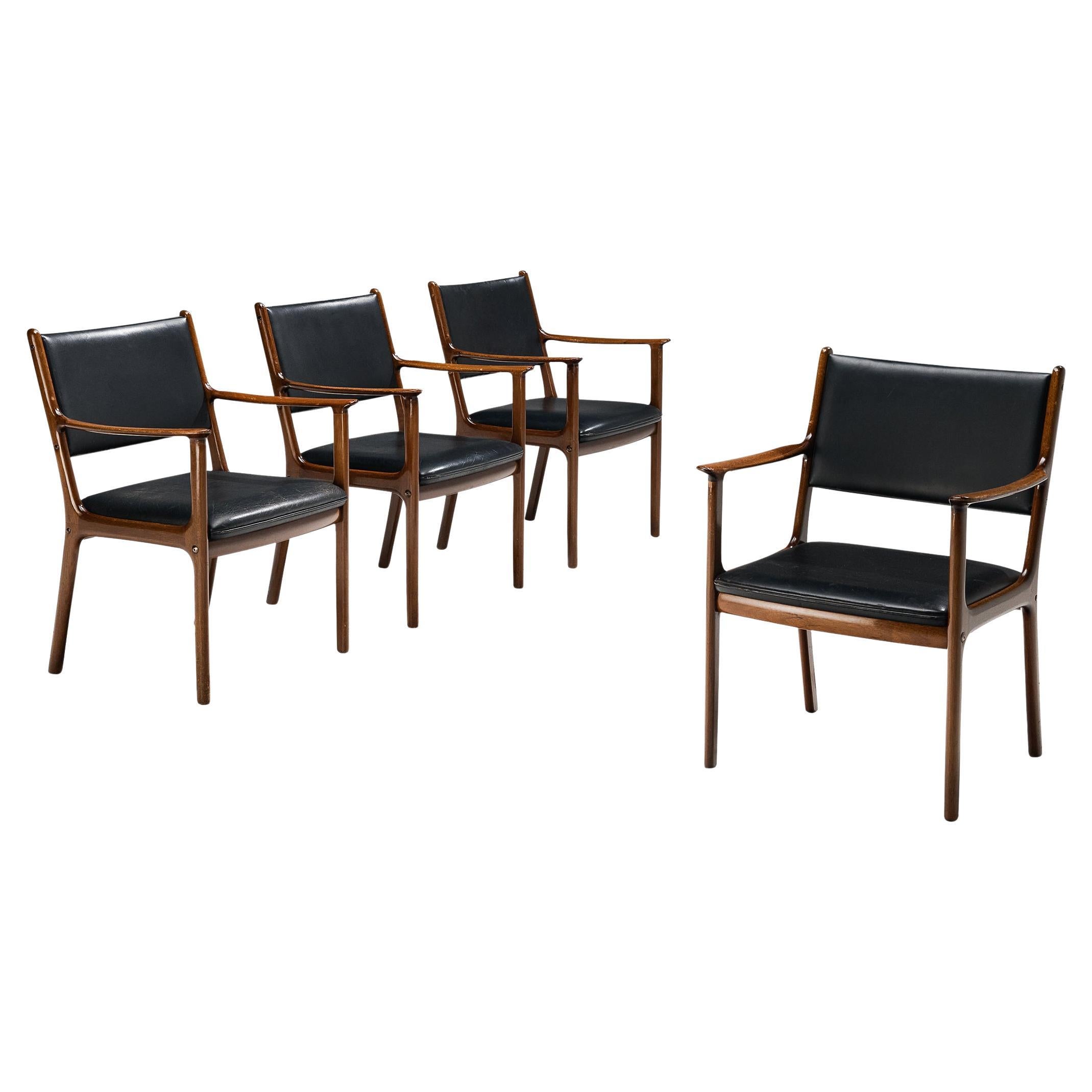 Ole Wanscher for Poul Jeppesen Set of Four Armchairs in Teak and Black Leather