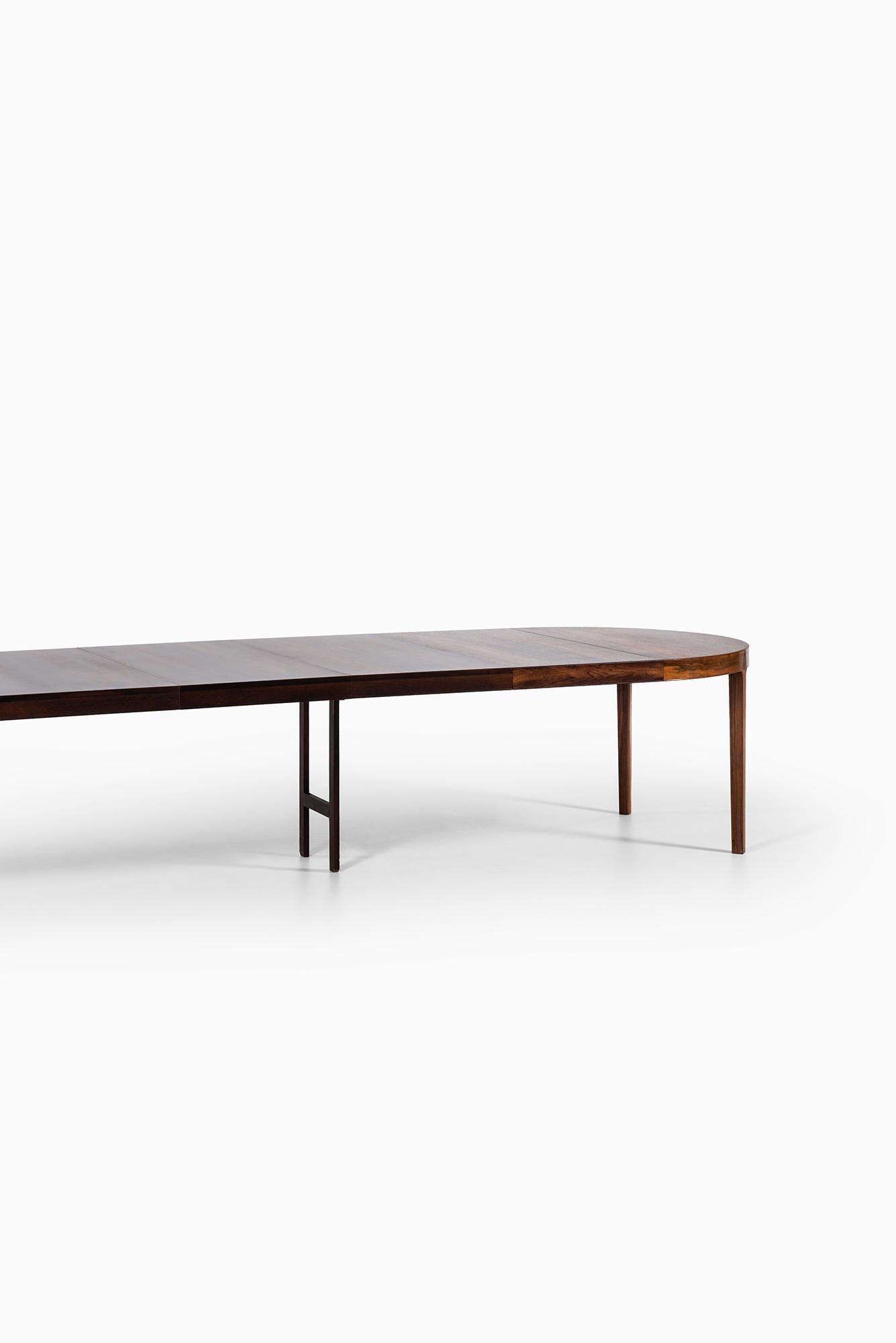 Very rare and large dining table designed by Ole Wanscher. Produced by cabinetmaker A.J. Iversen in Denmark.