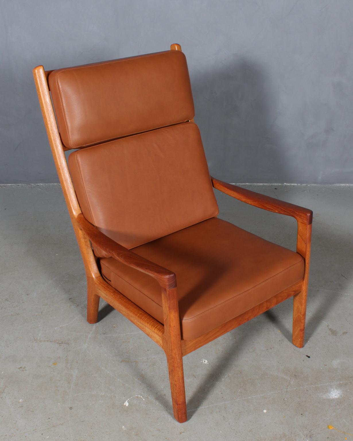 Ole Wanscher lounge new upholstered with tan aniline leather.

Made of solid teak.

Model senator, made by Cado.