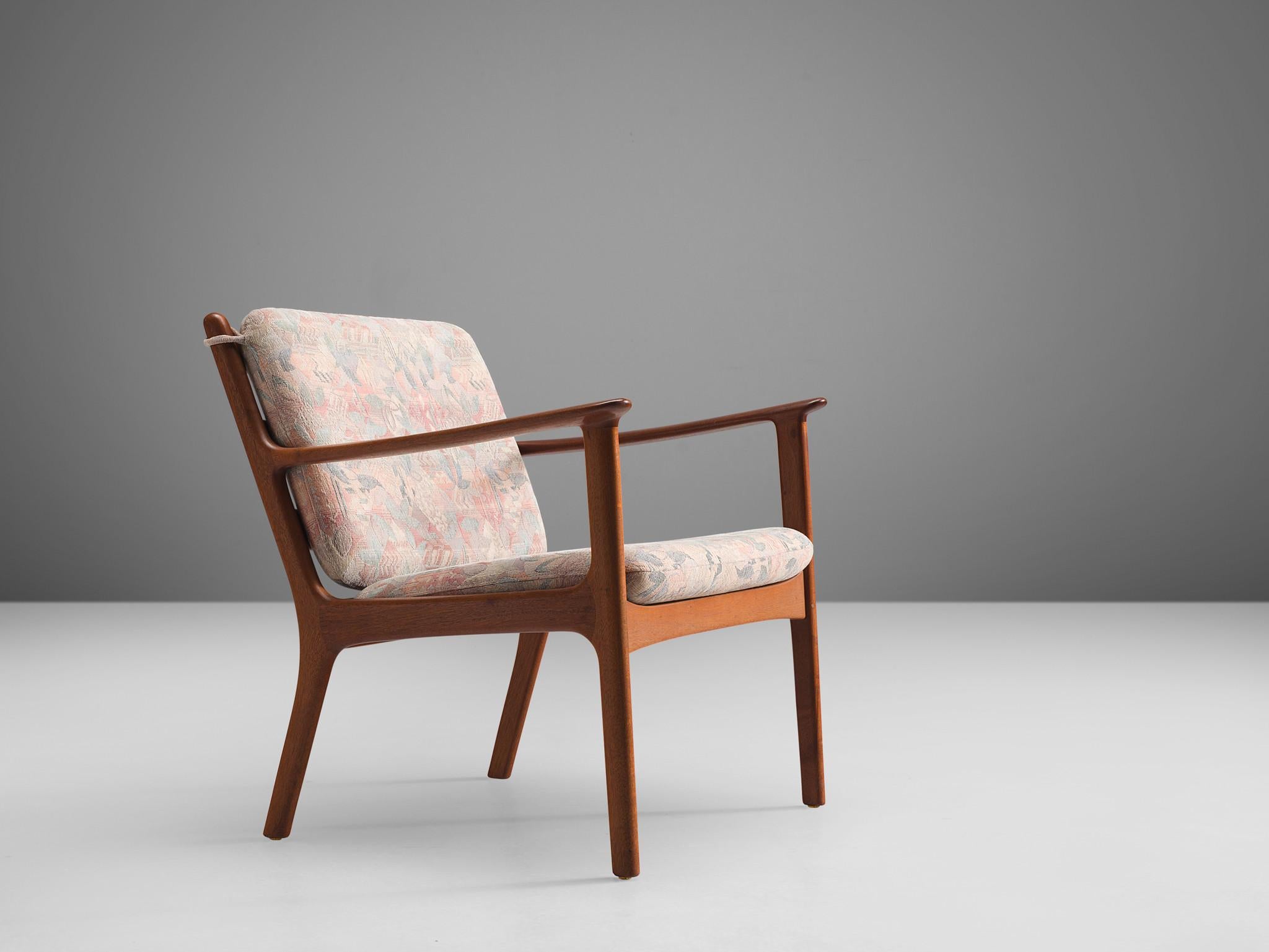 Ole Wanscher, chair, model 'PJ 112' mahogany, pink patterned fabric, Denmark, 1950s.

This delicate Danish chair is designed by Ole Wanscher. The frame shows elegant lines, especially in the armrests. The sofa is executed with tilted back, by means