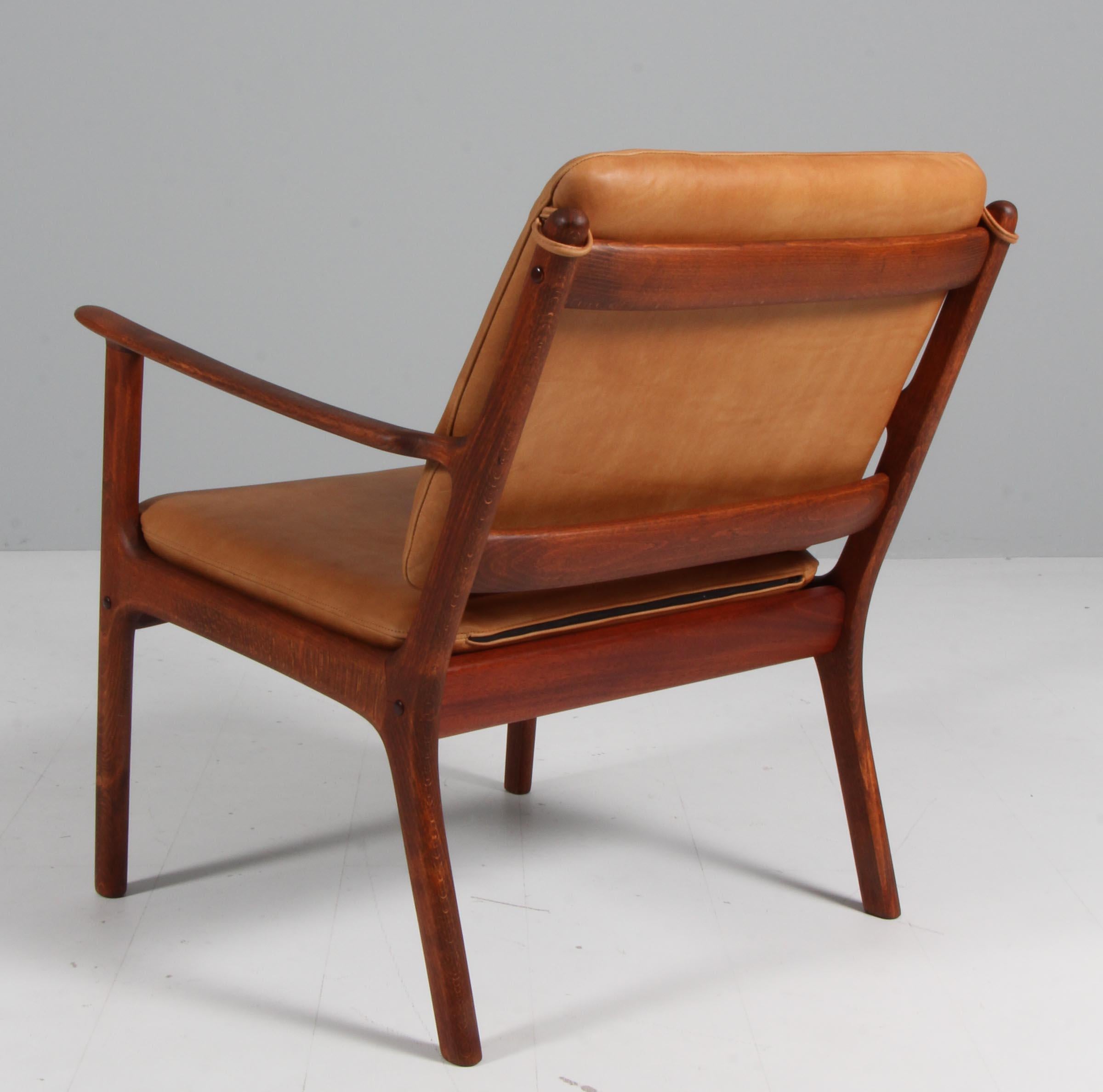 Danish Ole Wanscher Lounge Chairs, Model PJ112, Cognac Aniline Leather, stained beech For Sale