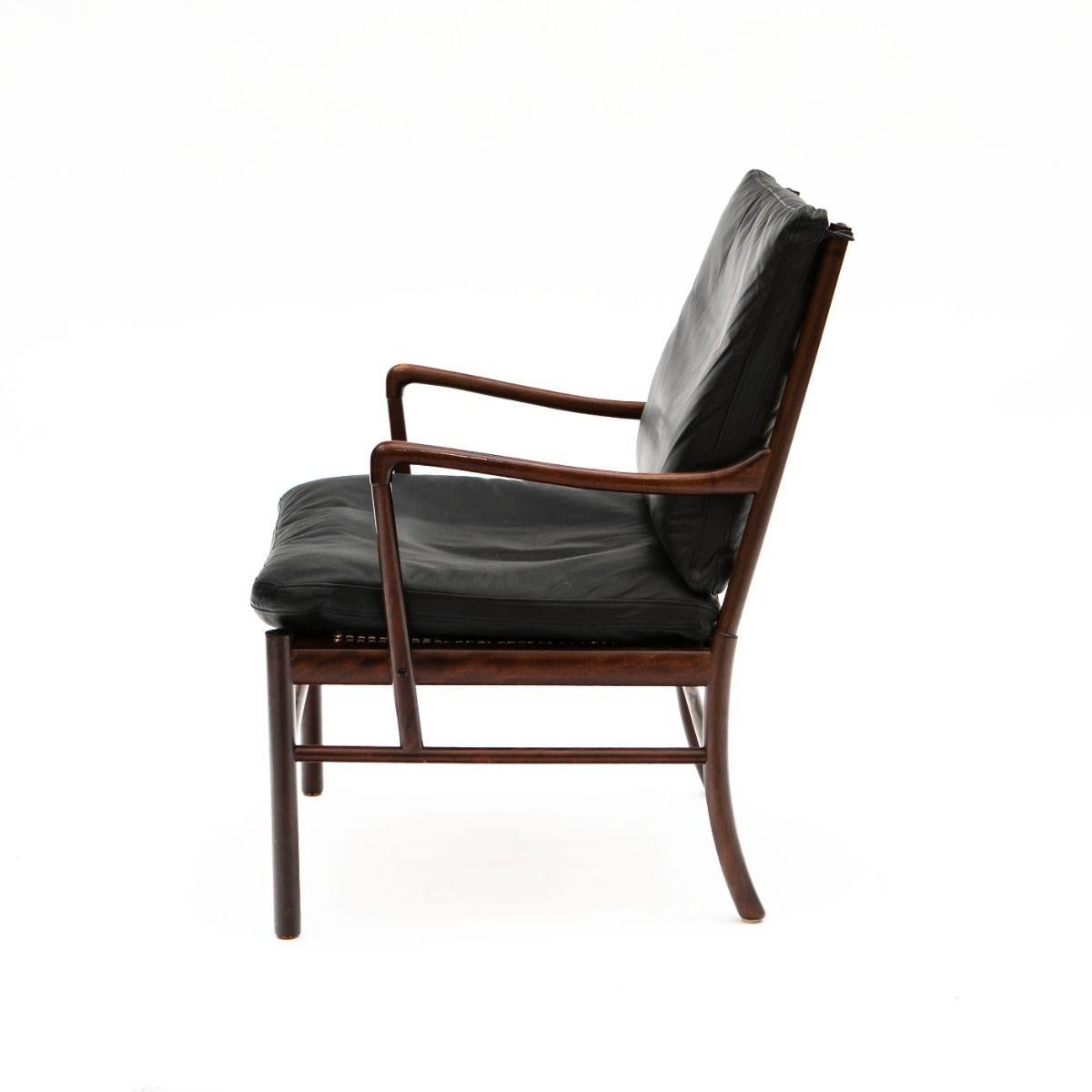 Ole Wanscher (1903-1985)
Colonial Chair in mahogany with black leather cushions and a wicker seat.
Designed in 1949 for P. Jeppesen Møbelfabrik. Produced by P.S. Møbler between 1960 and 1970.
Vintage piece in excellent, untouched original