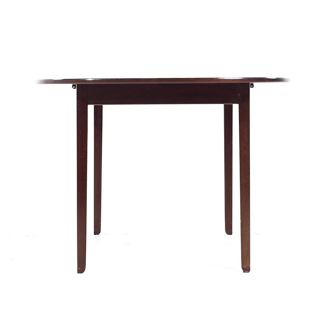 Ole Wanscher Mid Century Danish Rosewood Expanding Dining Table with 2 Leaves In Good Condition For Sale In Countryside, IL