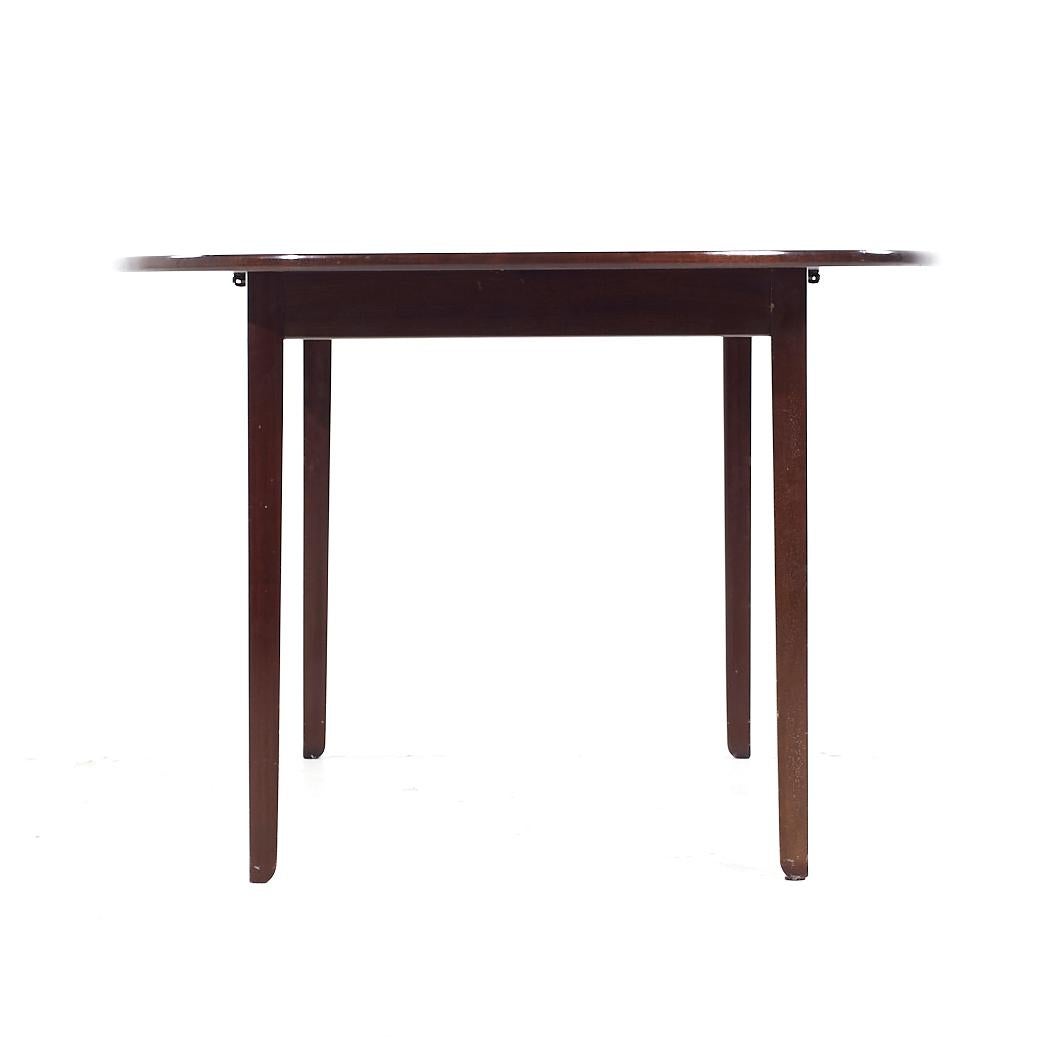 Ole Wanscher Mesa de comedor extensible de palisandro danés de mediados de siglo con 2 hojas Danés en venta