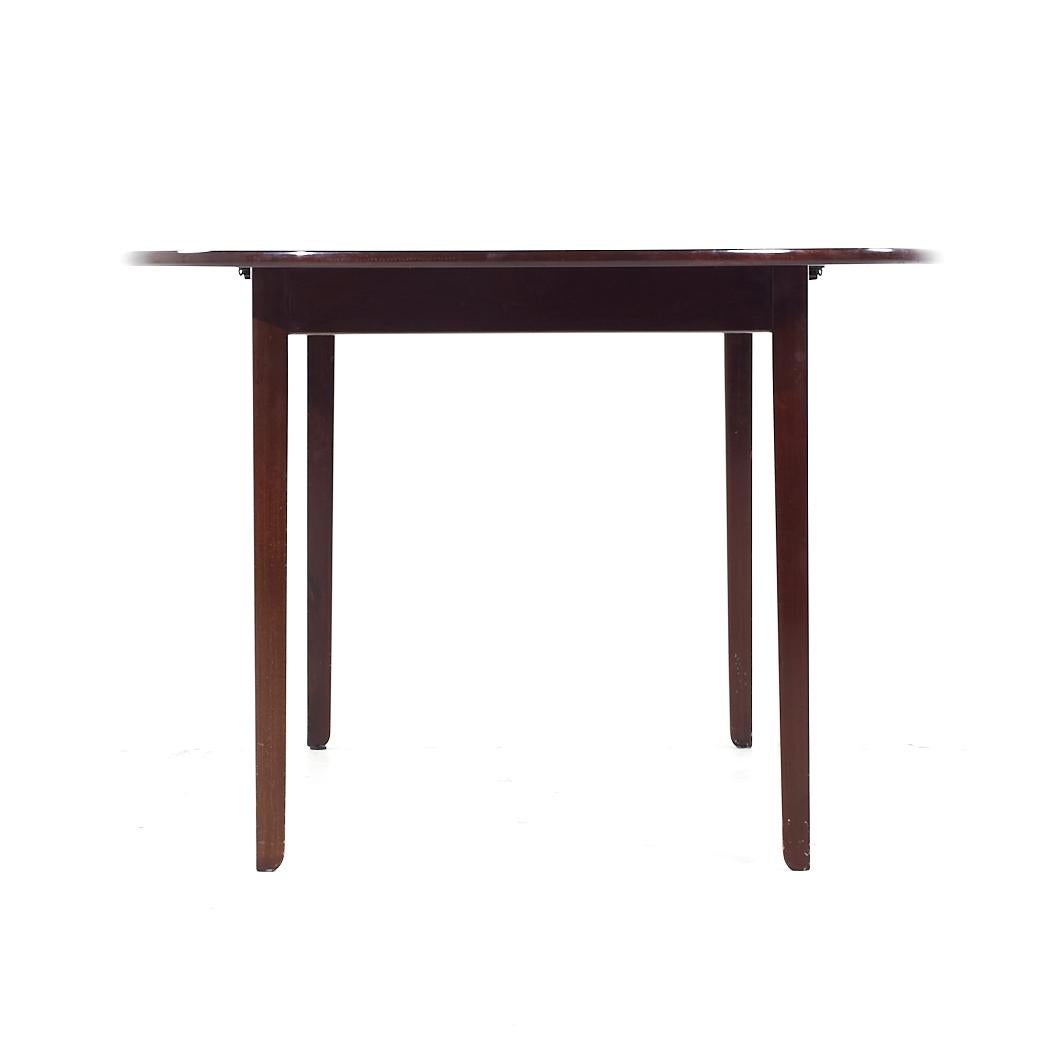 Late 20th Century Ole Wanscher Mid Century Danish Rosewood Expanding Dining Table with 2 Leaves For Sale