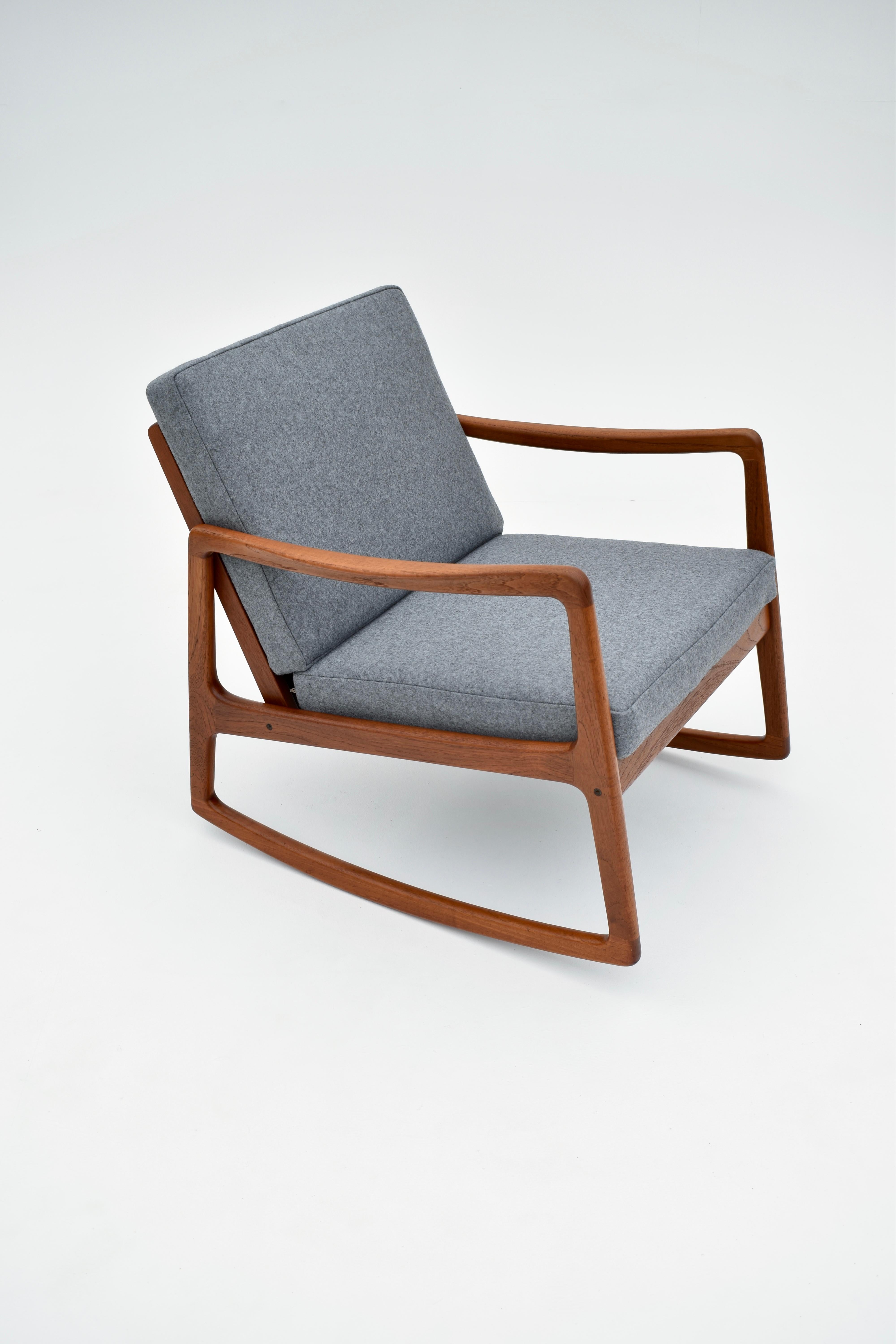 A superb and hard to find teak rocking chair designed by Ole Wanscher for France & Son, Denmark.

An absolute triumph of a design, the slenderness of the frame is remarkable there is not a line out of place, this has always been one of our