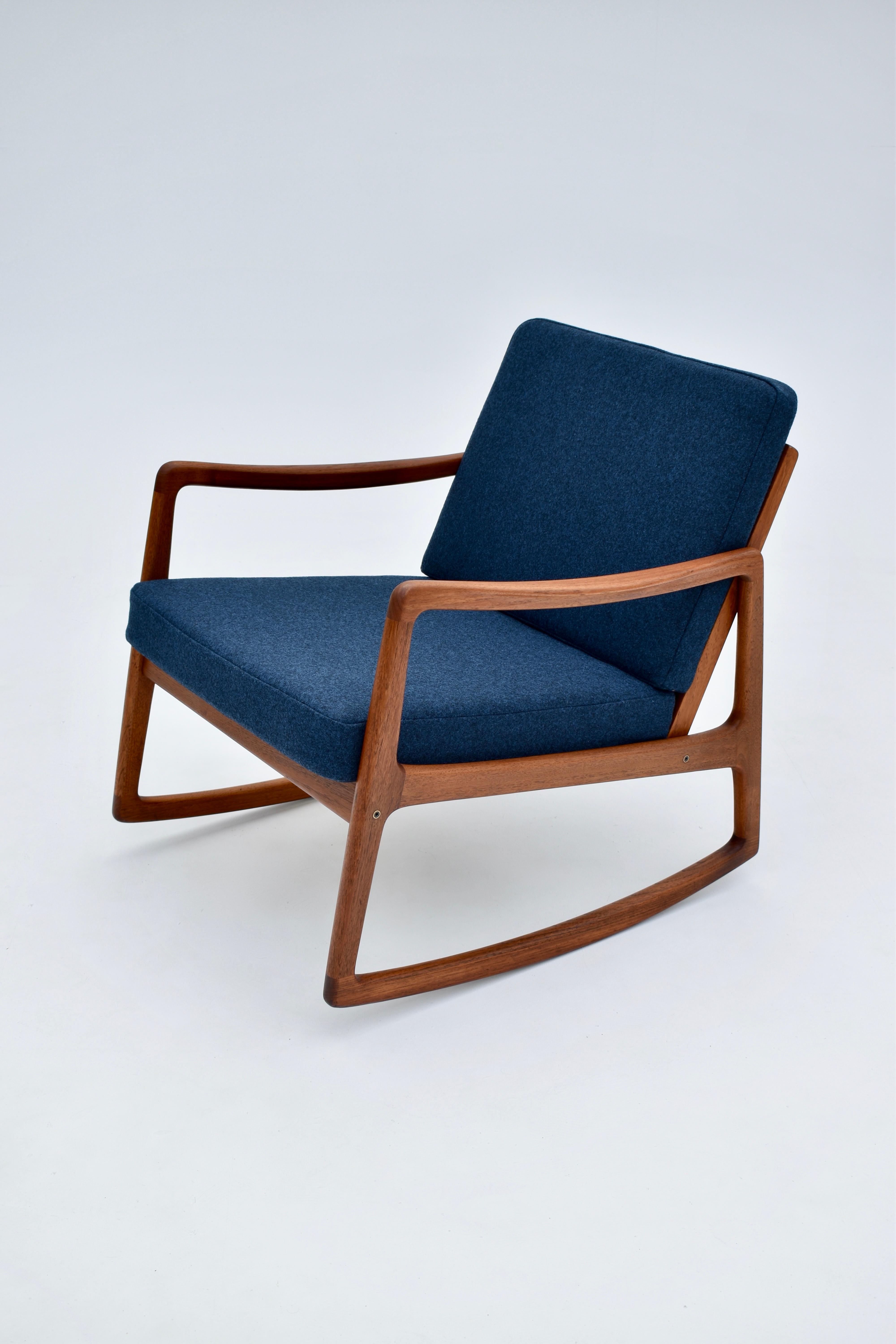 A superb and hard to find teak rocking chair designed by Ole Wanscher for France & Son, Denmark.

An absolute triumph of a design, the slenderness of the frame is remarkable and there is not a line out of place, this has always been one of our