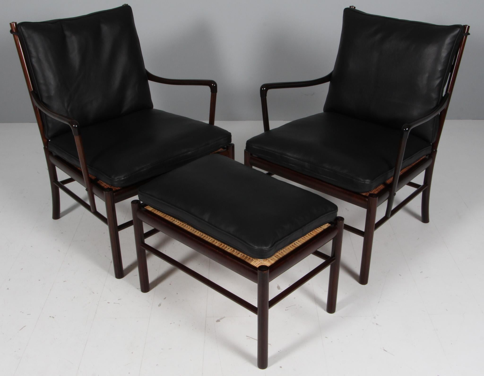 Pareja de sillones y otomana Ole Wanscher y nuevo tapizado de cuero anilina pura flor negro.

Fabricado en caoba. 

Silla colonial modelo PJ 149, fabricada por Poul Jeppesen.