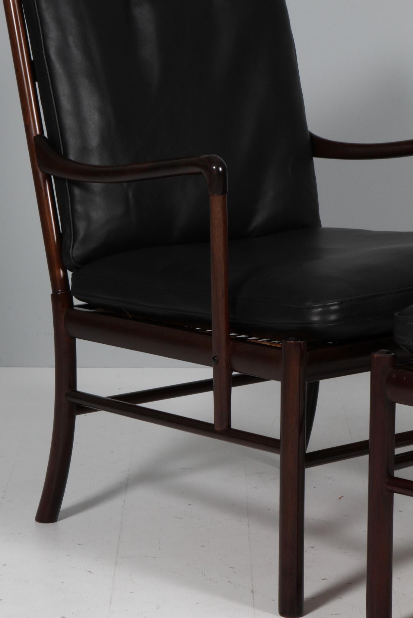 Ole Wanscher par de sillones coloniales y otomana Danés en venta