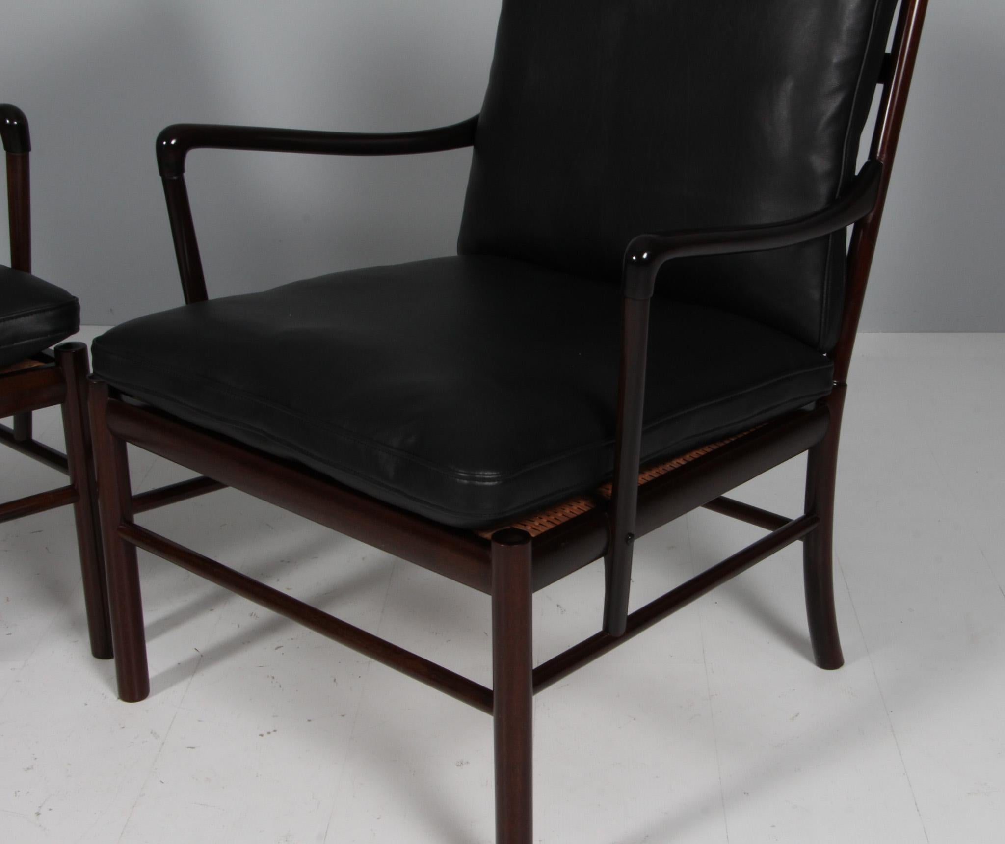 Ole Wanscher par de sillones coloniales y otomana Cuero en venta