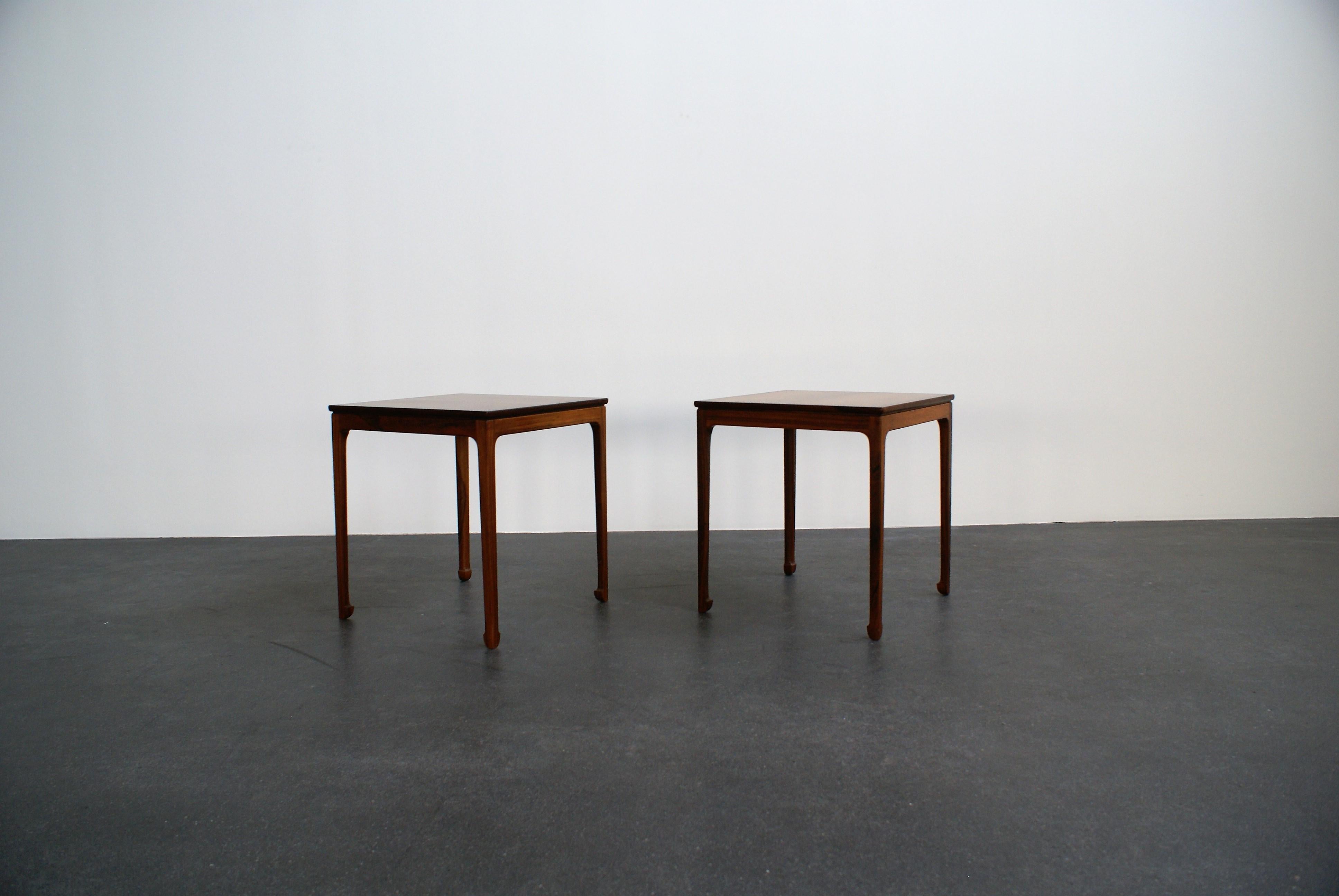 Pair of Ole Wanscher side tables in Brazilian rosewood for master cabinetmaker A. J Iversen. Very elegant pair of tables with spade feet and solid rosewood.

Litterature: Grete Jalk, ed., Dansk Møbelkunst gennem 40 aar, Volume 4 : 1957-1966,