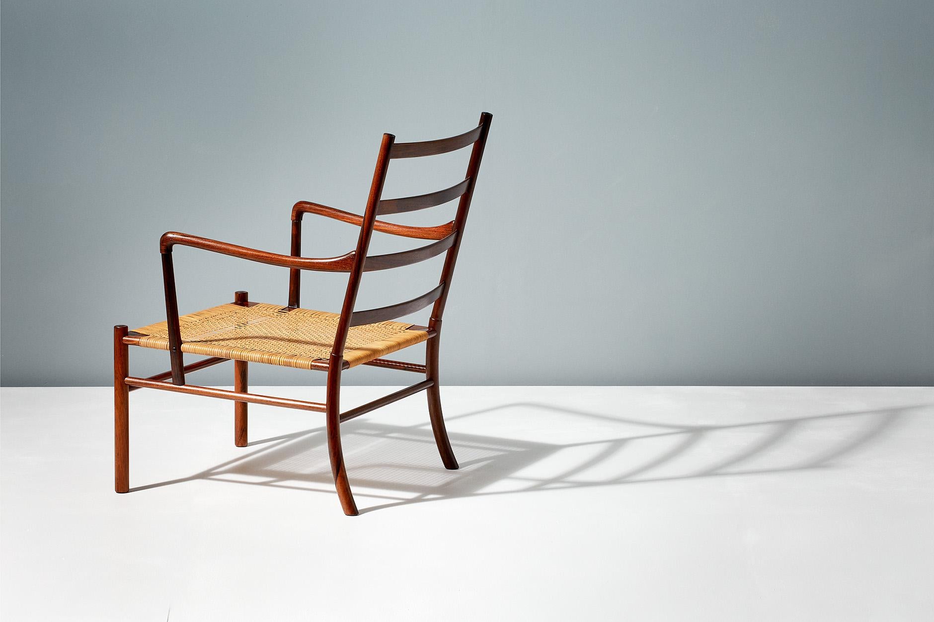 Ole Wanscher

PJ-149 colonial chair, 1949

The colonial chair is one of Wanscher’s best loved and most iconic designs, drawing influence from British and French Colonial furniture of the 18th-19th centuries. Produced by Poul Jeppesen, this