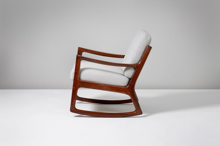 Rare rosewood edition of the 'Senator' rocking chair, circa 1960. Produced by France and Son, Denmark. Solid Brazilian rosewood. Includes maker's stamp and badge. New cushions covered in Kvadrat wool fabric.