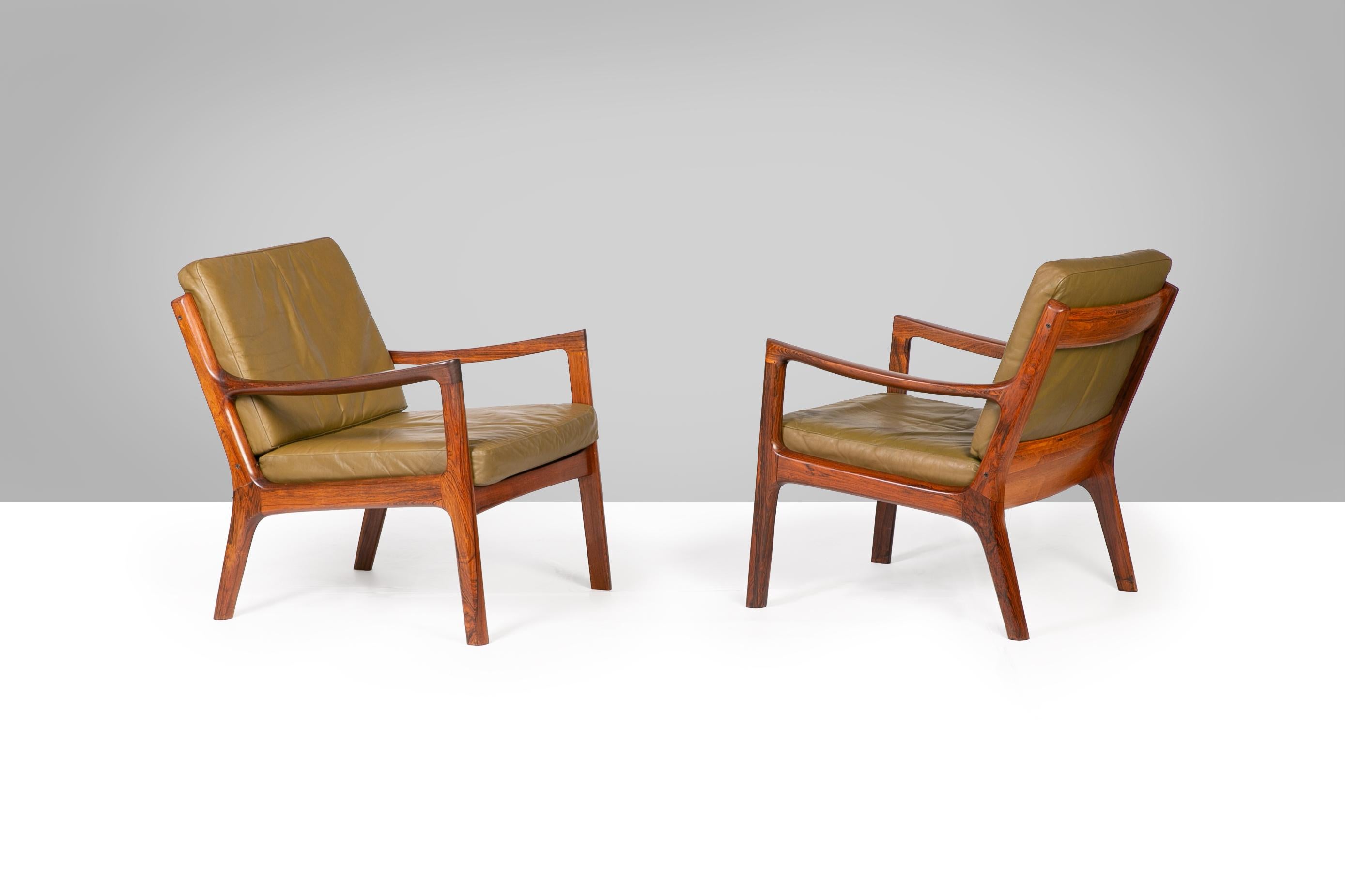Ole Wanscher Model 166 Senator Lounge Chairs 1951 in rosewood and leather, France and Son, Denmark 1950’s. 


Crafted in 1951, this exquisite pair of Model 166 Senator Lounge Chairs by Ole Wanscher is a masterclass in Danish modernism. Executed in