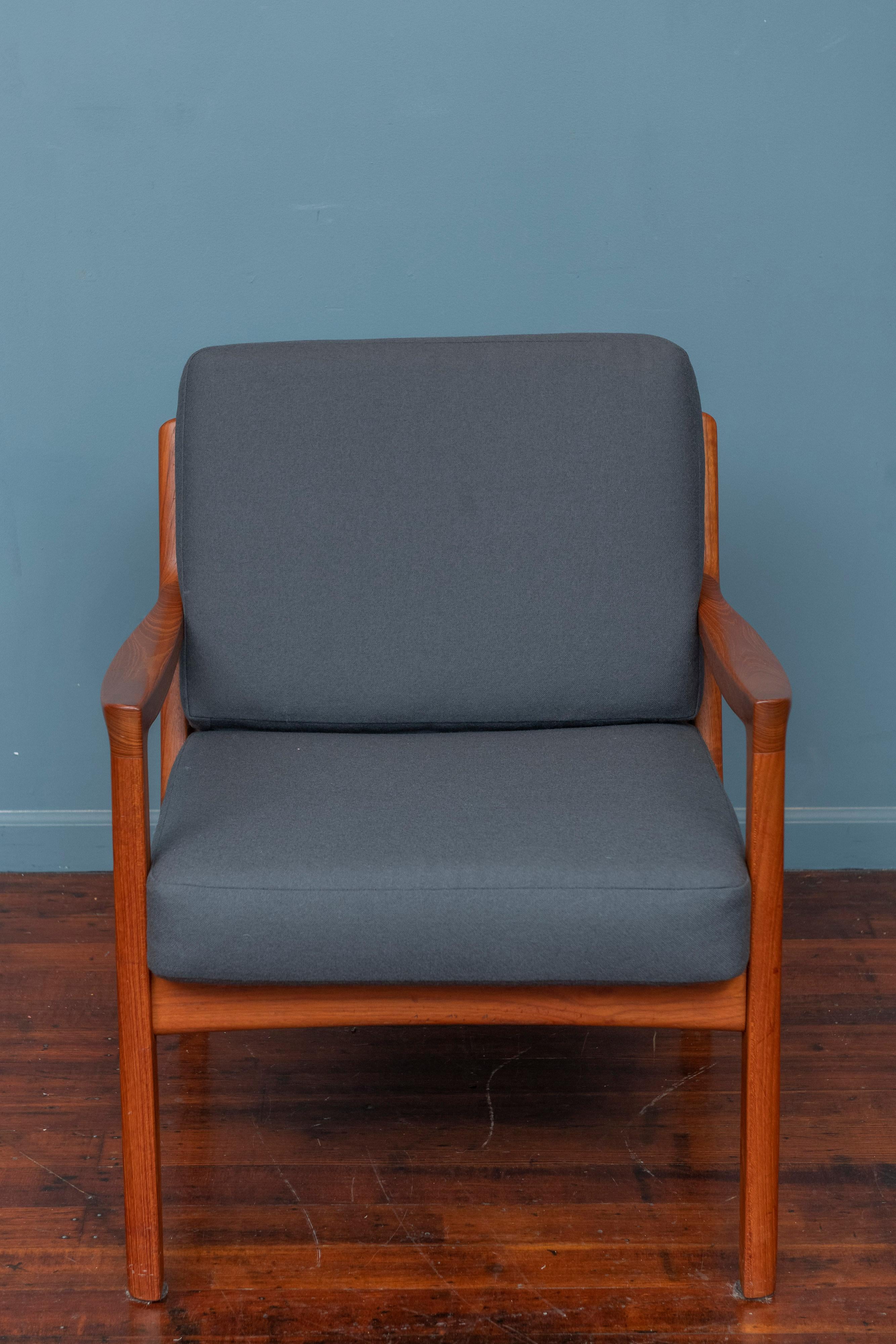 Ole Wanscher design lounge chair for France and Son Model 116, Denmark. 
High quality construction and materials using attractive end cuts of solid teak and hand sculpted edges throughout make for a simple yet attractive armchair. 
Newly