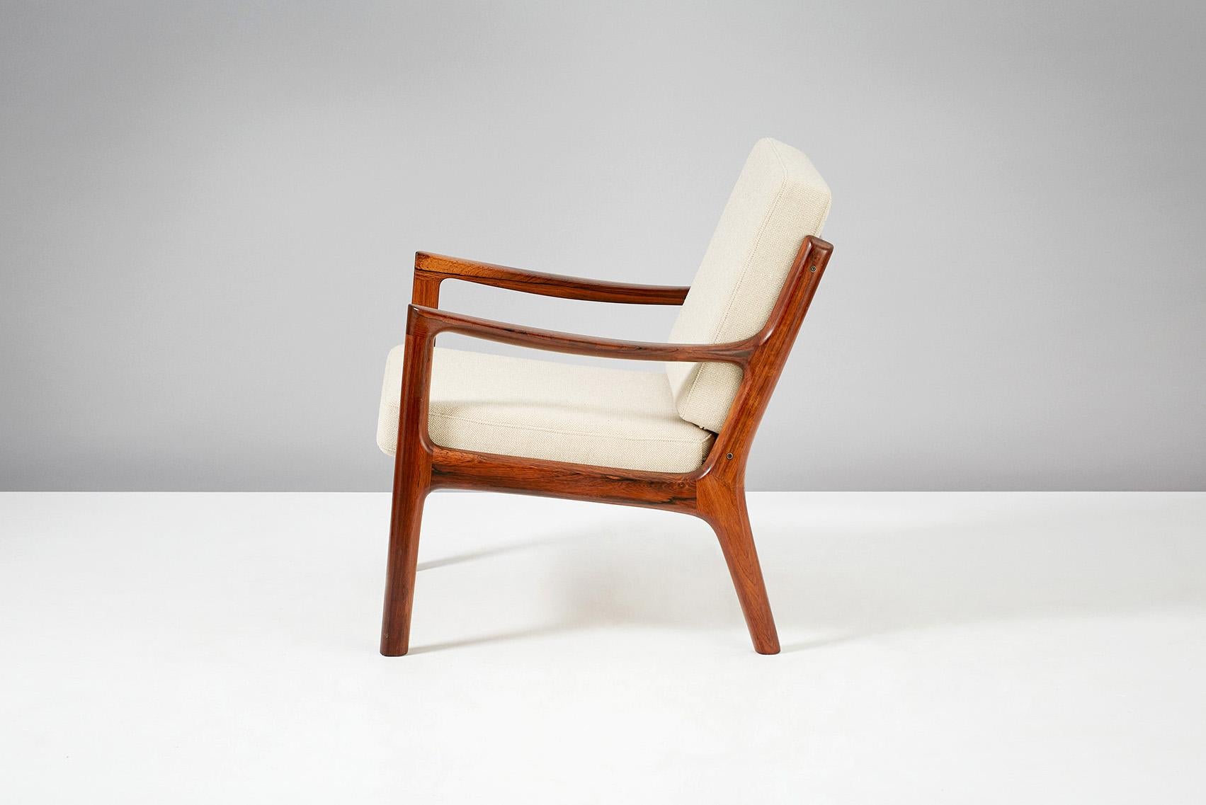 Ole Wanscher

Senator lounge chair, circa 1960

Limited edition rosewood version of this iconic design, produced by France & Son, Denmark. Includes maker's badge. New cushions covered in oatmeal color wool fabric.