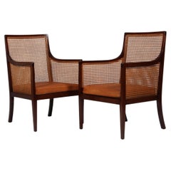 Ole Wanscher set of bergeres in mahogany, cane and patinated leather. 1930's