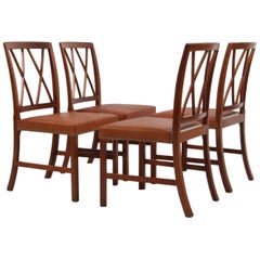 Ole Wanscher Set of Four Dining Chairs in Mahogany and Cognac Aniline Leather