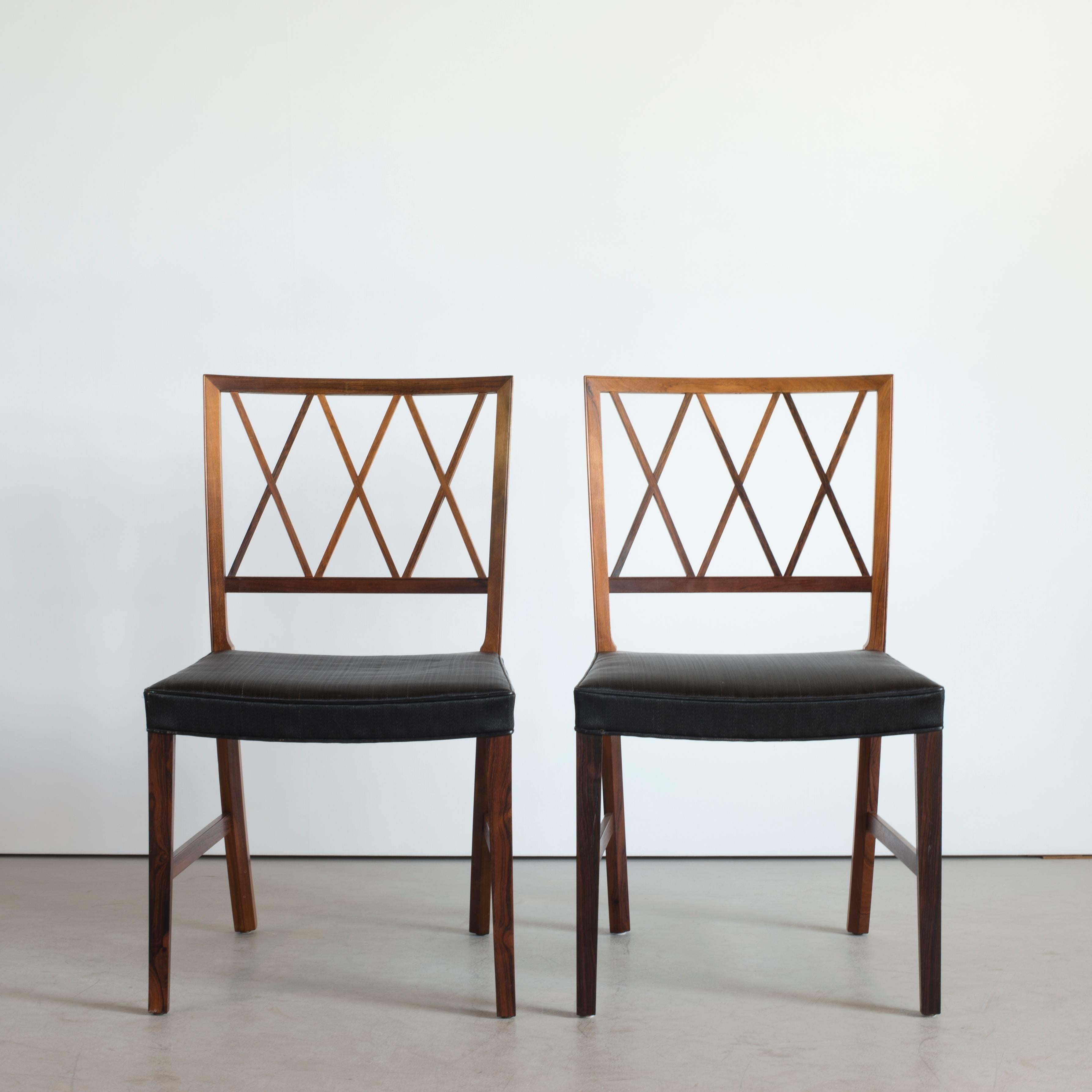 Set of six dining chairs by Ole Wanscher. Executed by A. J. Iversen for Illums Bolighus, Copenhagen, Denmark.

Rosewood and black horsehair.

Matching dining table available.