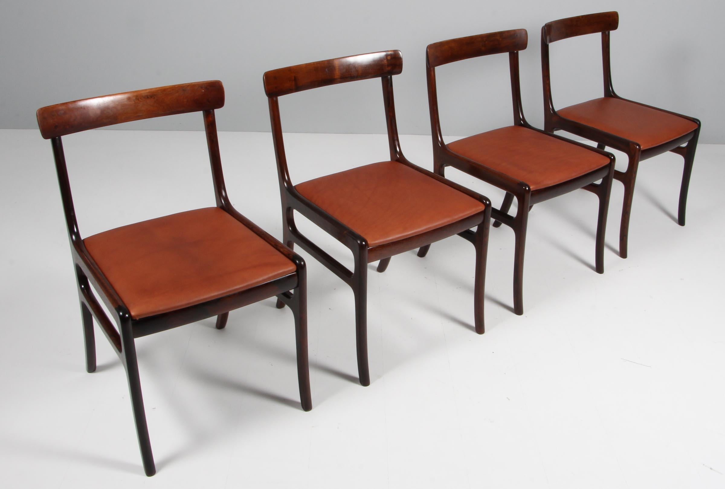 Ole Wanscher set of six Rungstedlun dining chairs in rosewood.

New upholstered with brandy aniline leather.

Model Rungstedlund, made by Poul Jeppesen.

