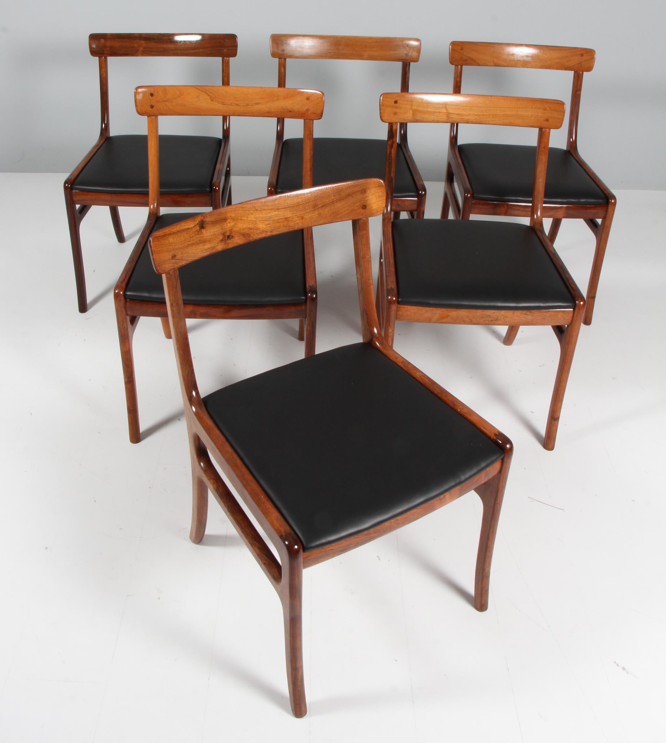 Ole Wanscher set of six Rungstedlun dining chairs in rosewood.

New upholstered with black aniline leather.

Model Rungstedlund, made by Poul Jeppesen.

