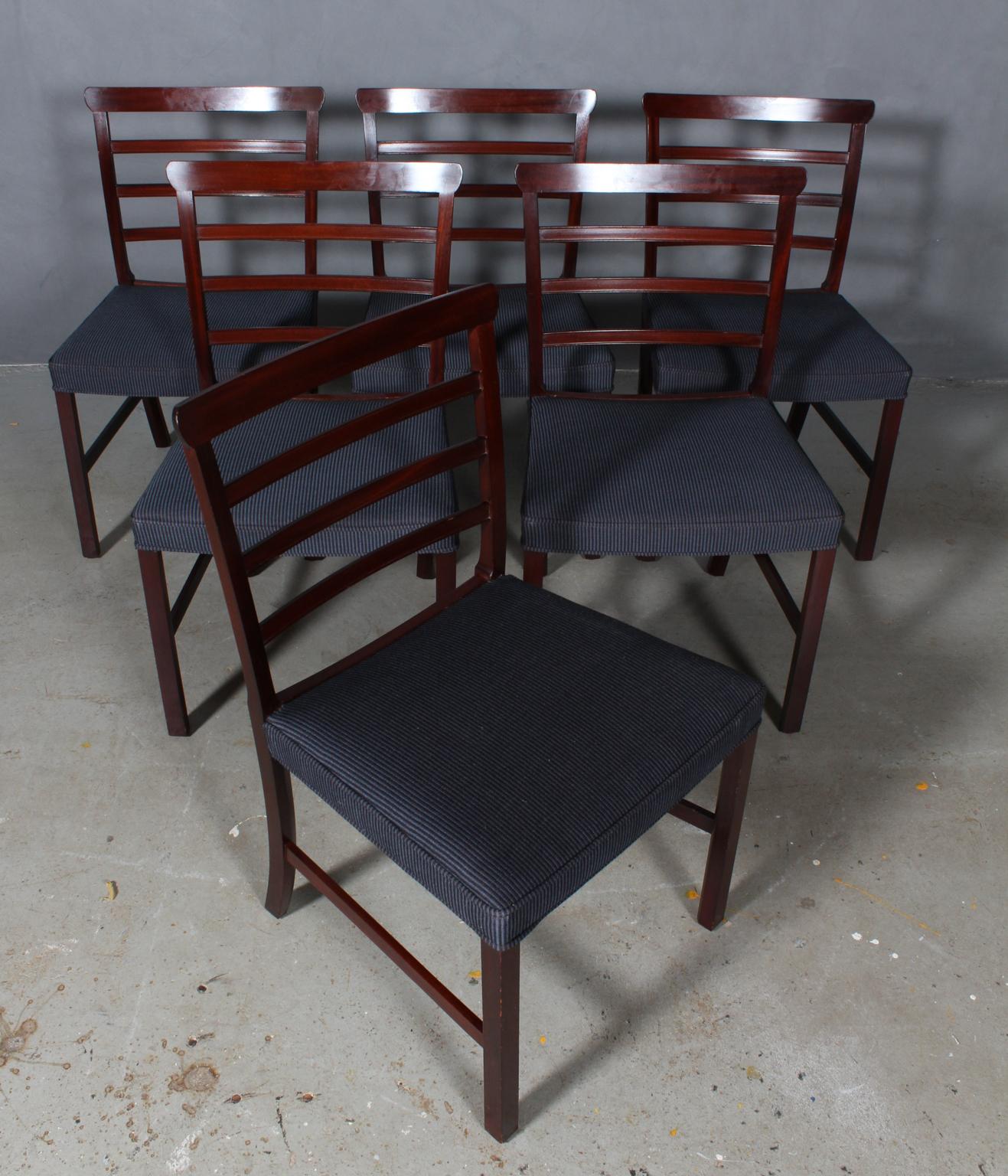 Ole Wanscher six dining chairs in mahogany.

Made by A. J. Iversen.

  