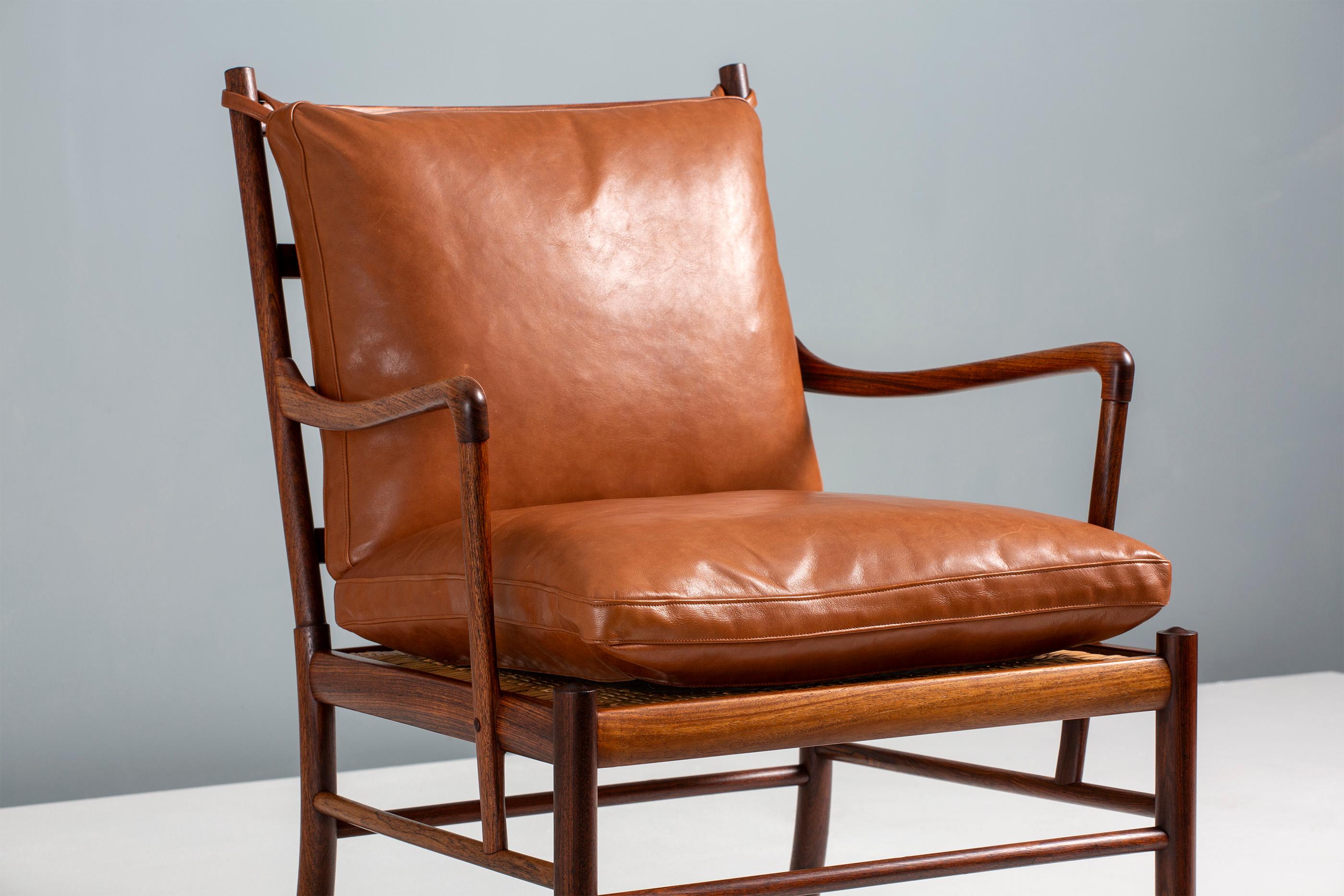 Ole Wanscher

PJ-149 Colonial Chair, 1949

Rosewood frame with original woven rattan cane seat. Produced by Poul Jeppesen in Denmark, c1950s. The original feather cushions have been covered in new cognac brown aniline leather.