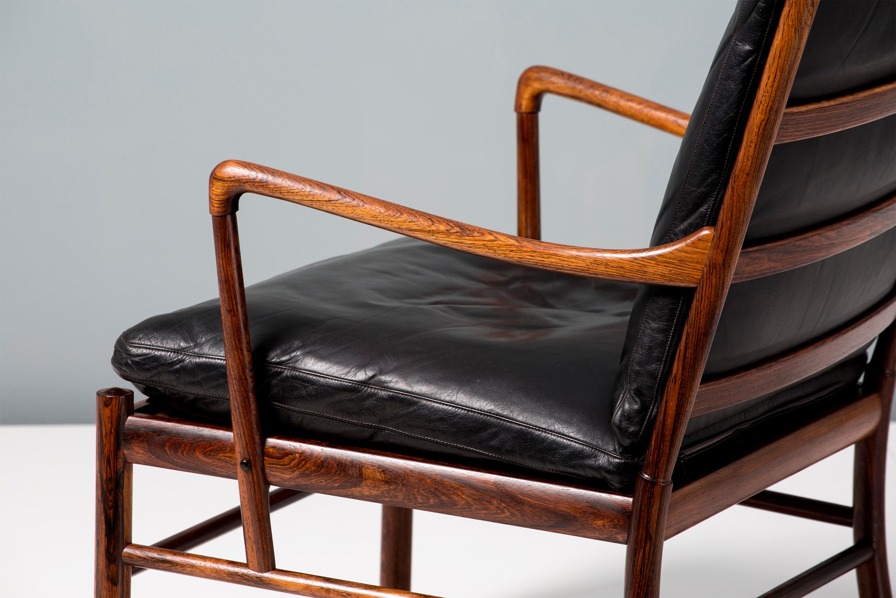 Ole Wanscher

PJ-149 Colonial chair and ottoman, 1949

A fine example of Ole Wanscher's most iconic design: The Colonial chair. Produced by Poul Jeppesen in Denmark circa 1950s in exquisite Brazilian rosewood with original woven rattan cane seat