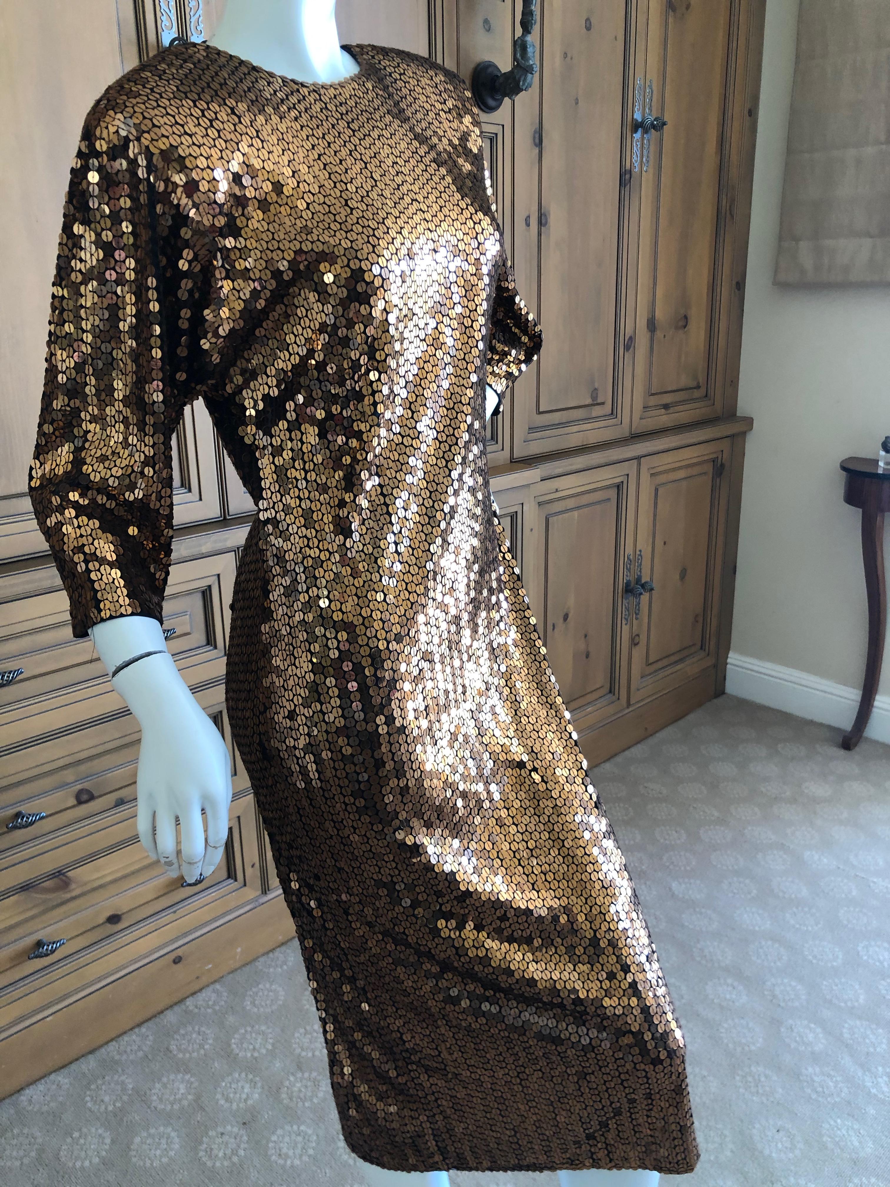 Oleg Cassini 1970's Sequin Disco Era Dress.
This is such a classic example of disco dressing.
Vintage size 10
Bust 38
