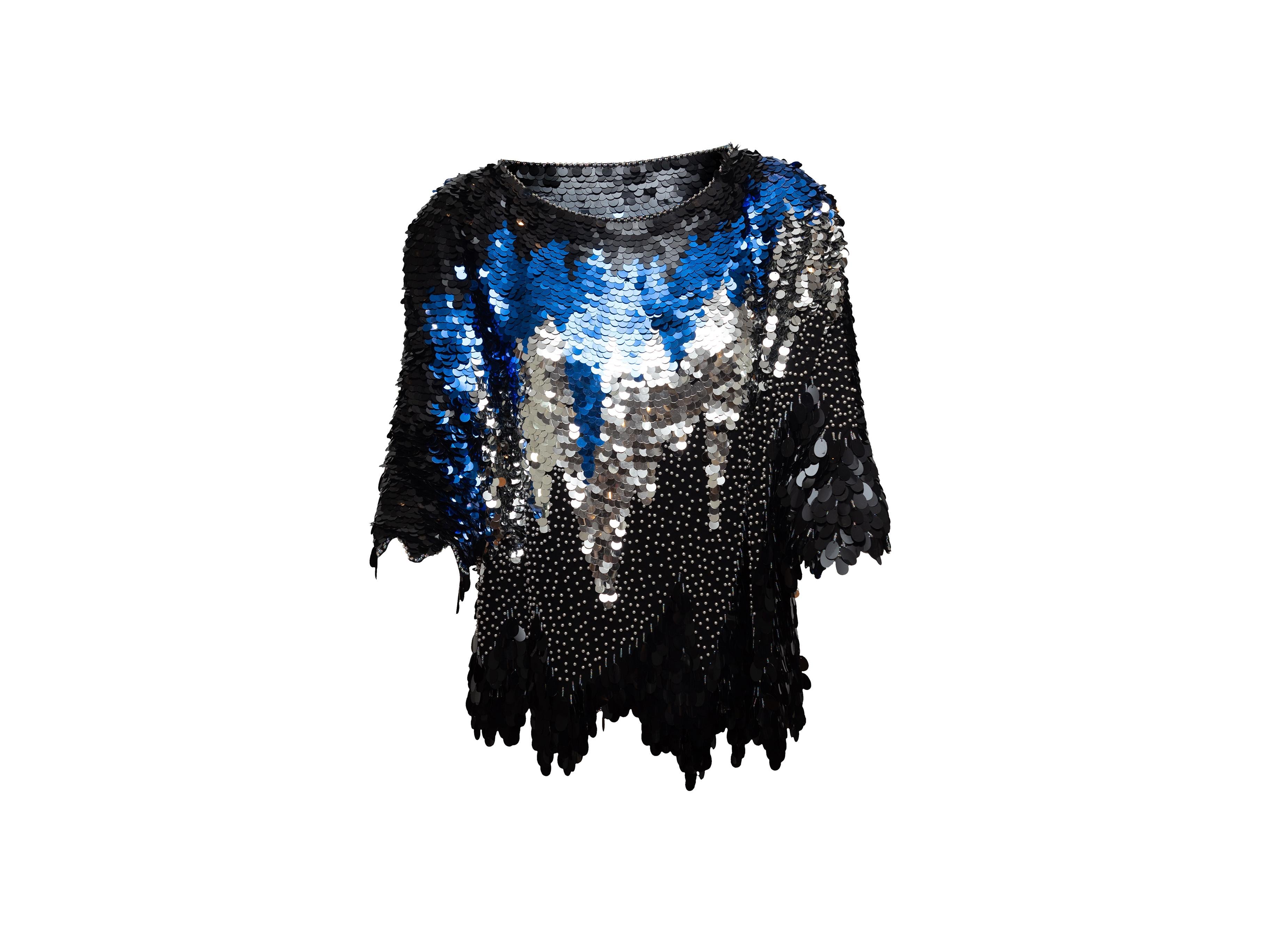 Product details: Vintage black, silver, and blue silk sequined top by Oleg Cassini. Round neckline. Three-quarter sleeves. 46