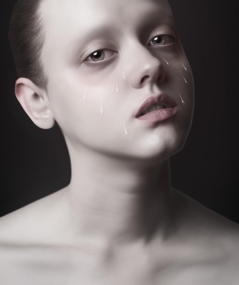This Oleg Dou work is a 63 x 47 inch digitally rendered C-print which has been face mounted on acrylic. It was printed in 2015, and is one of eight editions. This soft and somber image features a highly idealized human profile. The forlorn gaze of