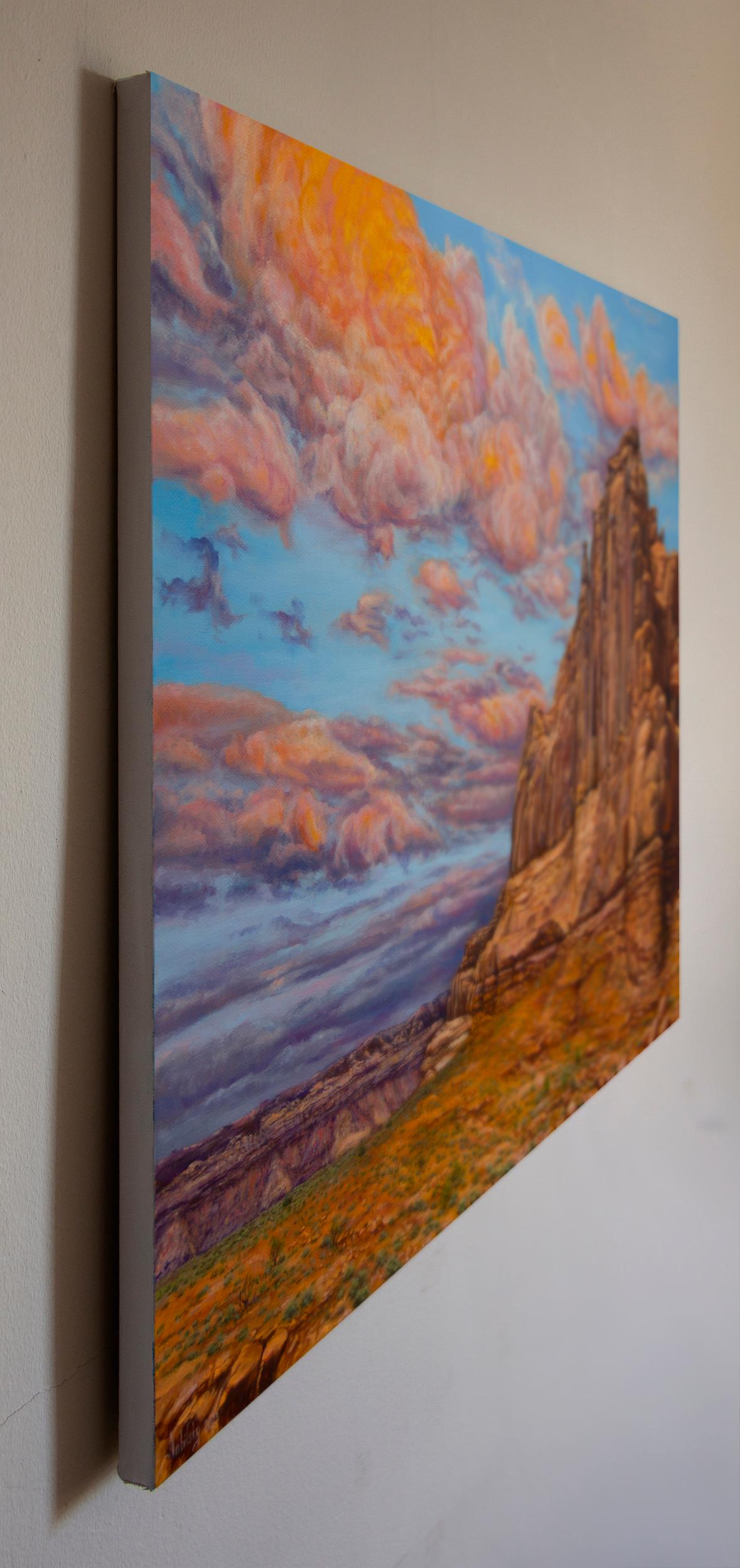 <p>Commenti dell'artista<br />I caldi raggi del sole estivo illuminano una formazione rocciosa nel Grand Canyon. Attraverso luci e ombre, il paesaggio rivela i suoi bellissimi contorni, scolpiti nel corso di milioni di anni dalla forza della natura.