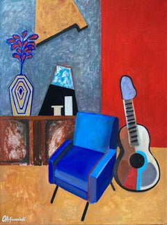 Interieur mit blauem Sessel und Gitarre