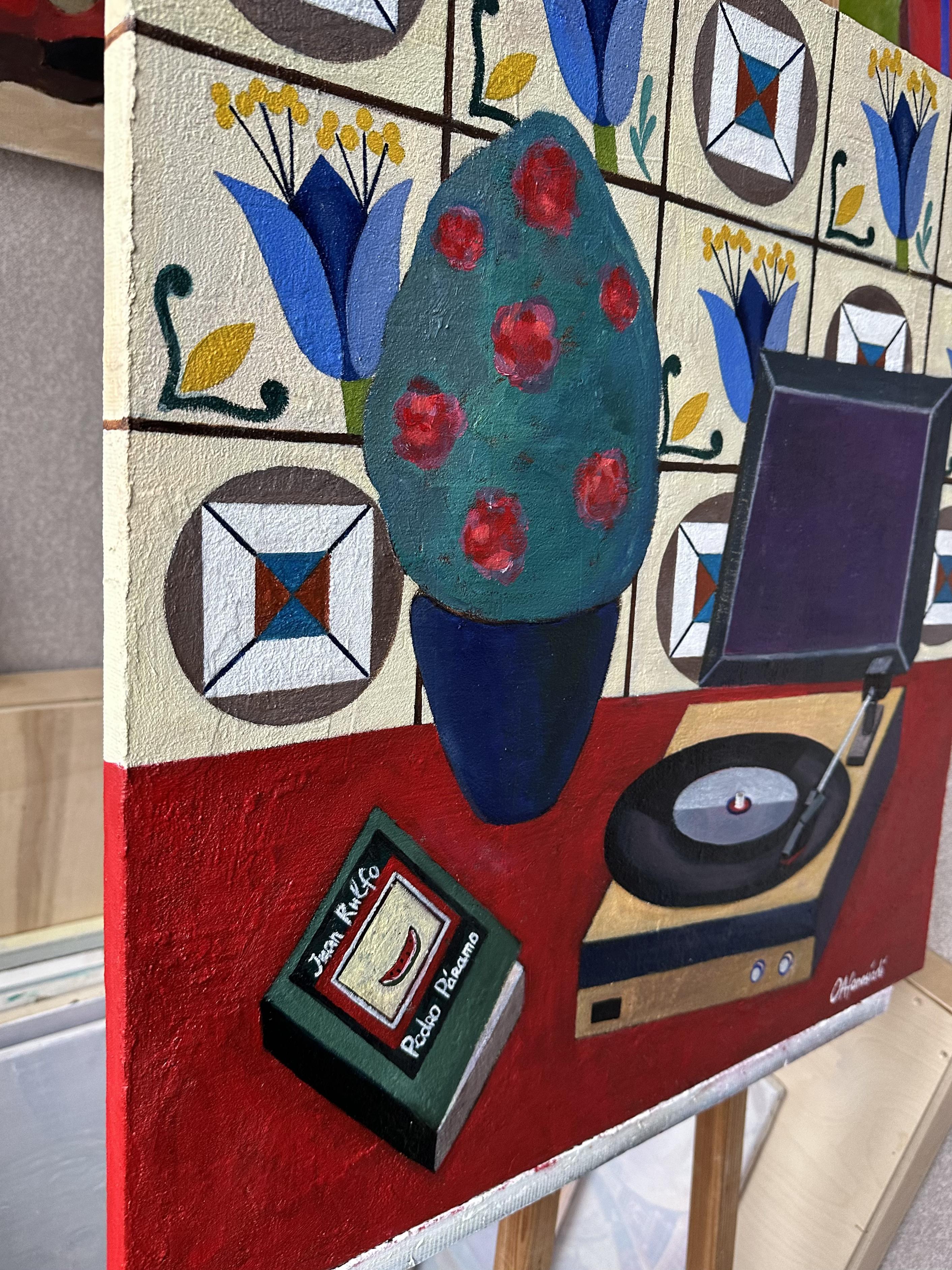 This still life contains everything that distinguishes the rich culture of Latin America - azulejo tiles, which came from Portugal, a book by Mexican writer Juan Rulfo, bush dwarf roses and a vinyl record player. The warm and bright color refers the