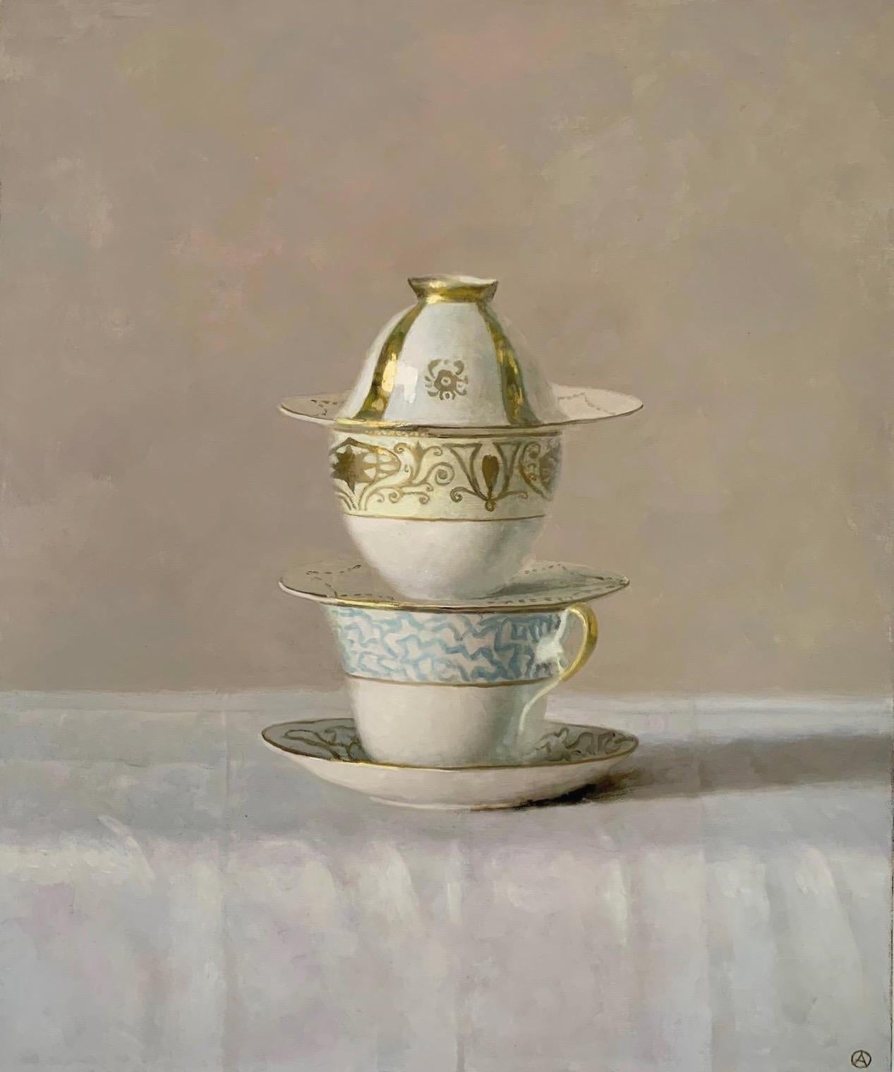 Olga Antonova Still-Life Painting - 'Still Life of White Blue and Gold Cups Stacked in a Tier on Beige Background'