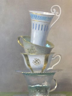 Four Stacked Cups White, Blue, Green, Gold, Silver on Tan with Checkerboard Edge