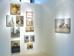 "Elegant Still Life of Glass with Blue Dots and Gold and Blue Cup"