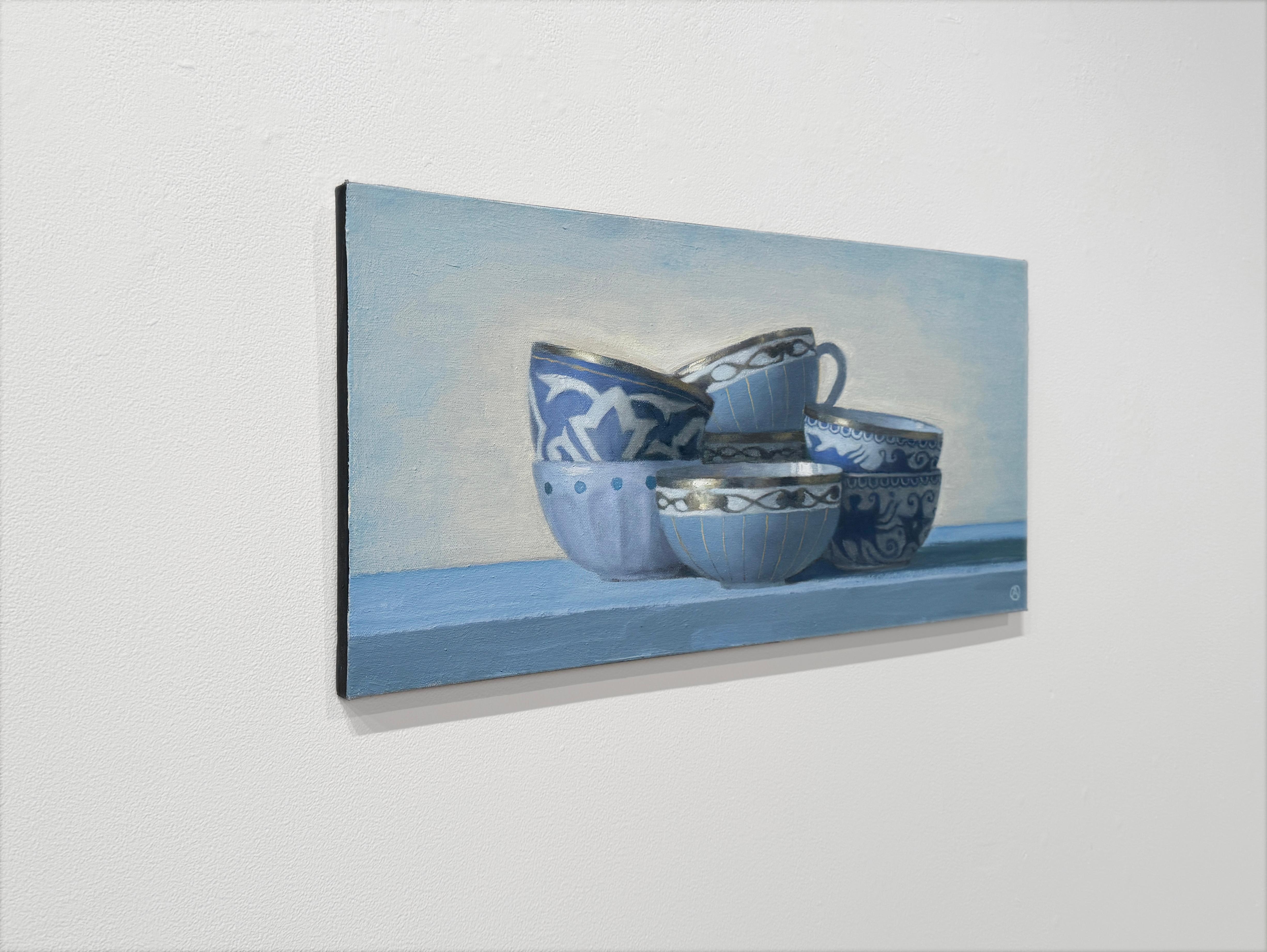 SIX BLUE CUPS - Still life /  Realism / Teacups / Kitchen - Contemporary Painting by Olga Antonova