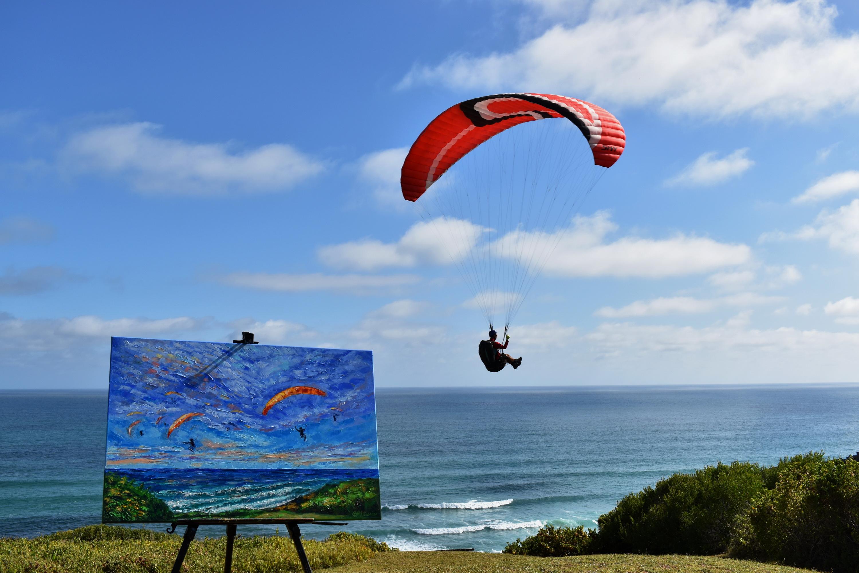 Paraglidiing Fly above the Ocean - Impressionist Painting by Olga Nikitina