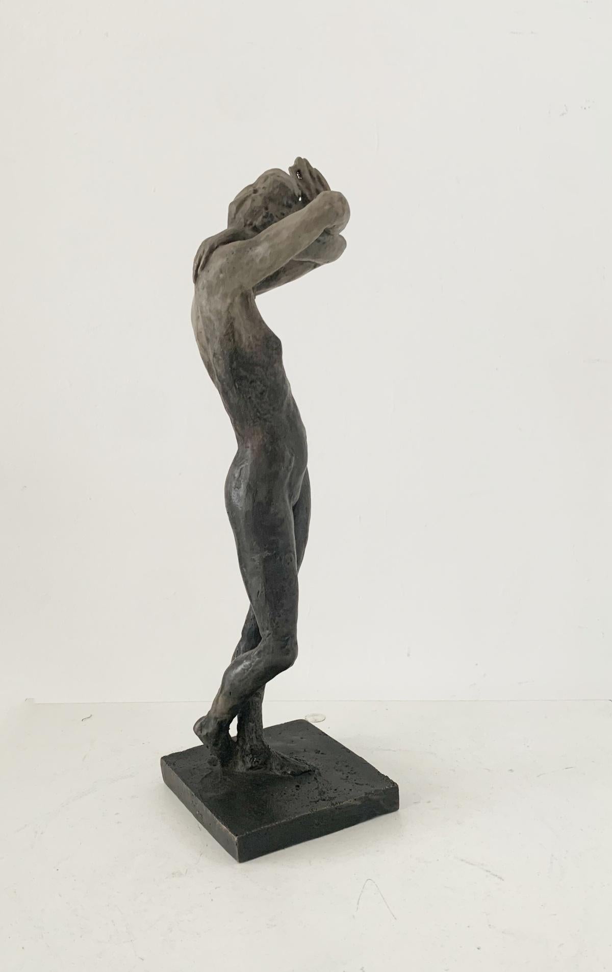 polishing bronze sculpture