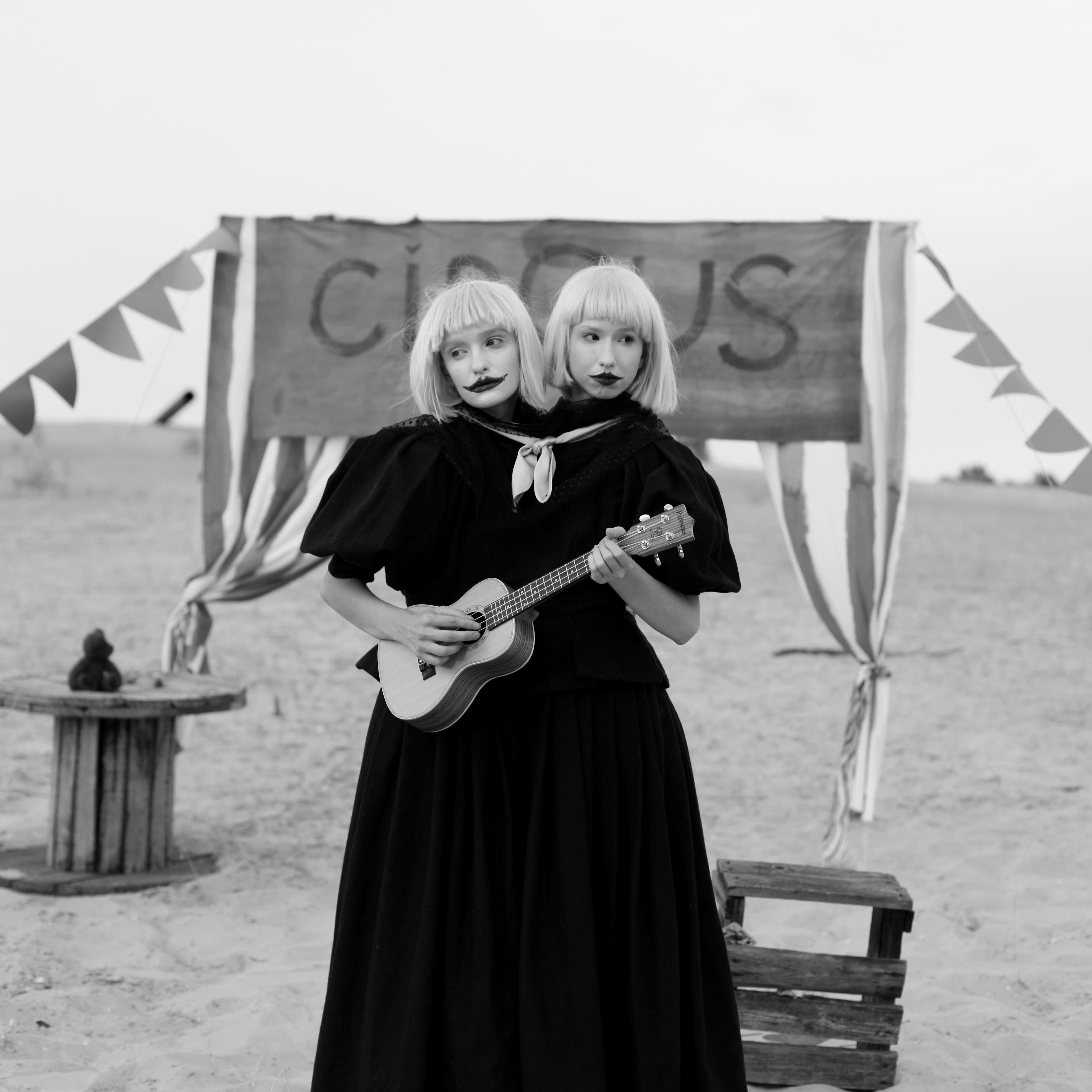 "Sisters (Circus)" Photography 31" x 31" inch Edition of 7 by Olha Stepanian

Printed on Epson Professional Paper 
Signed and numbered by the artist   
Not framed. Ships in a tube.    

Available sizes:			
Edition of 24			16" x 16" inch
Edition of
