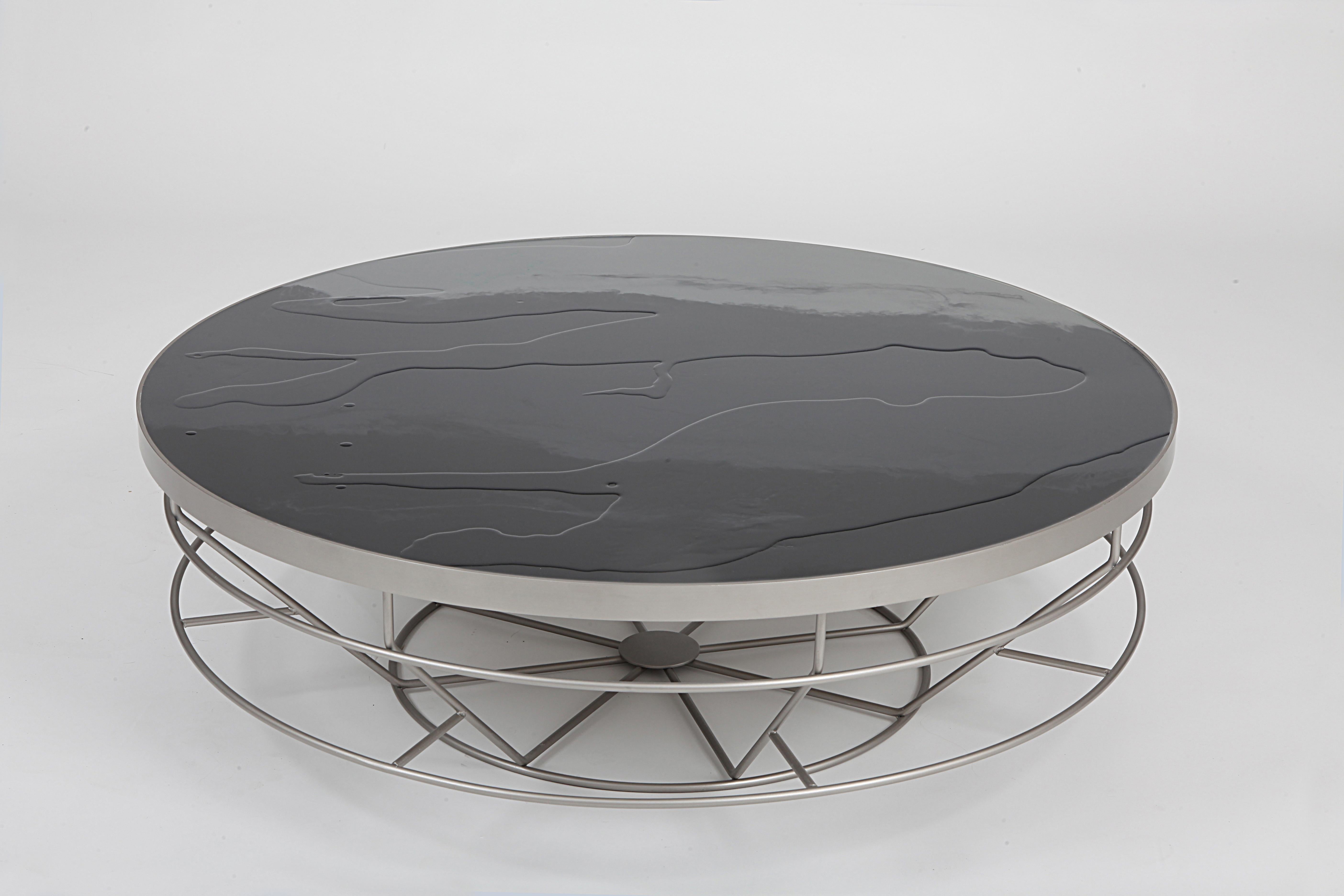 Olis Coffee Table by Dalmoto
Dimensions: Ø 95 x H 30 cm.
Materials: Nichel Marino nickel and resin.

Available in different metal and resin options. Available in two sizes. Please contact us. 

Silo and Olis are metal coffee tables with a resin top.