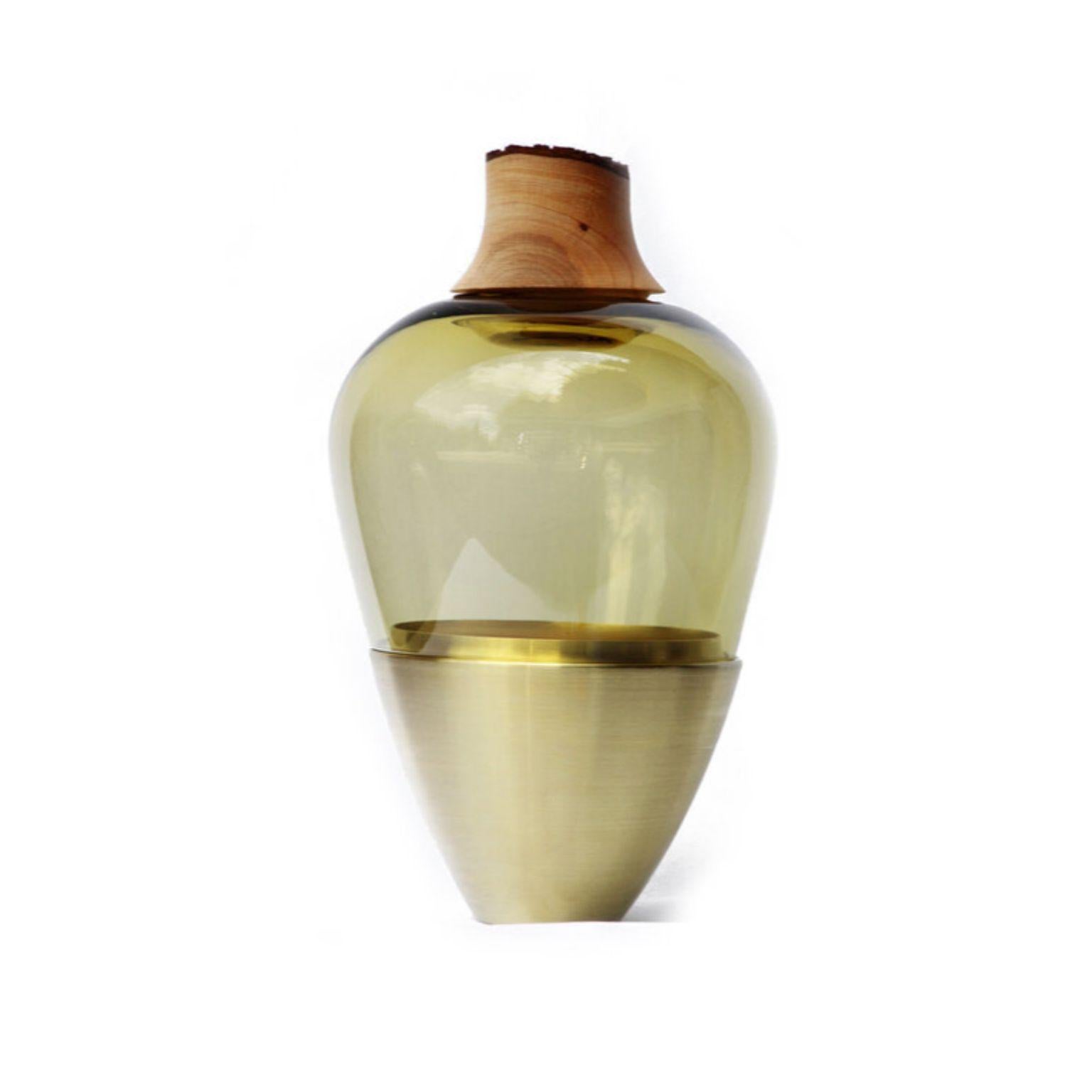 Olive and brass sculpted blown glass, Pia Wüstenberg
Dimensions: Height 20 x diameter 38cm
Materials: Hand blown glass, brass

Pia Wüstenberg, Utopia
Pia Wüstenberg is a creative with a passion for materials and craft. She graduated from the